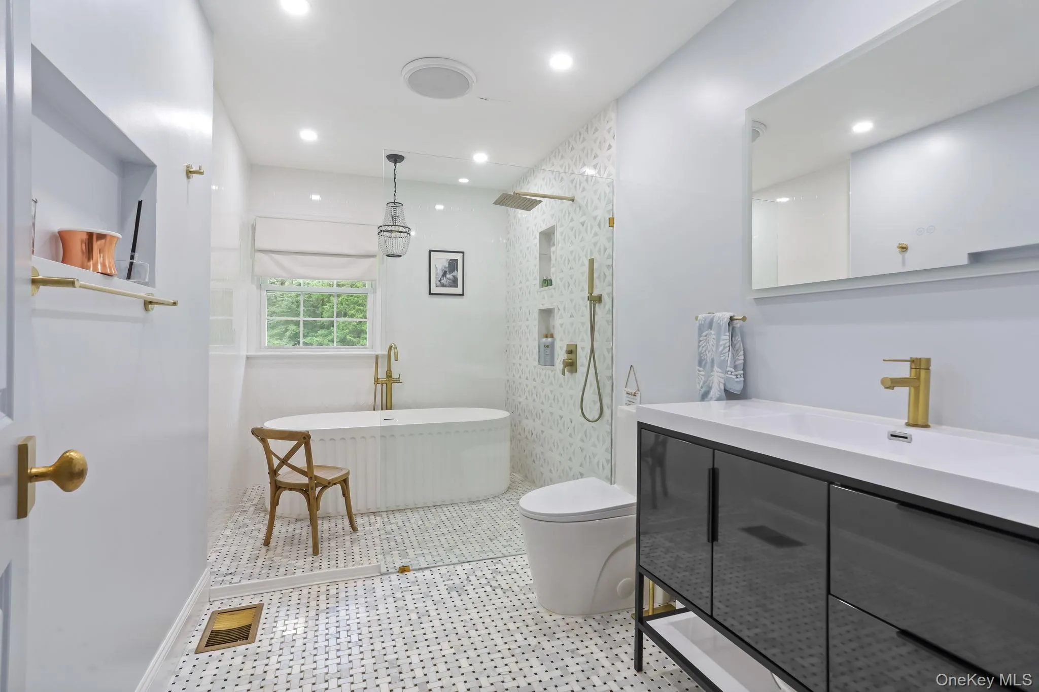 Hall bathroom with vanity, a soaking tub, walk in shower, and recessed lighting Hall bathroom with vanity, a soaking tub, walk in shower, and recessed lighting