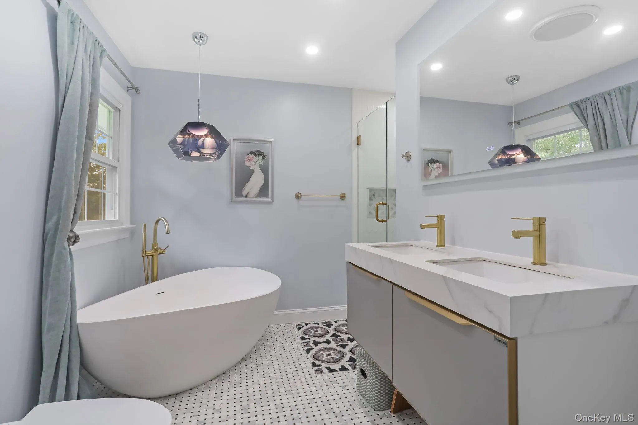 Primary Bathroom featuring a soaking tub, double vanity, light tile patterned floors, a stall shower, and recessed lighting Primary Bathroom featuring a soaking tub, double vanity, light tile patterned floors, a stall shower, and recessed lighting