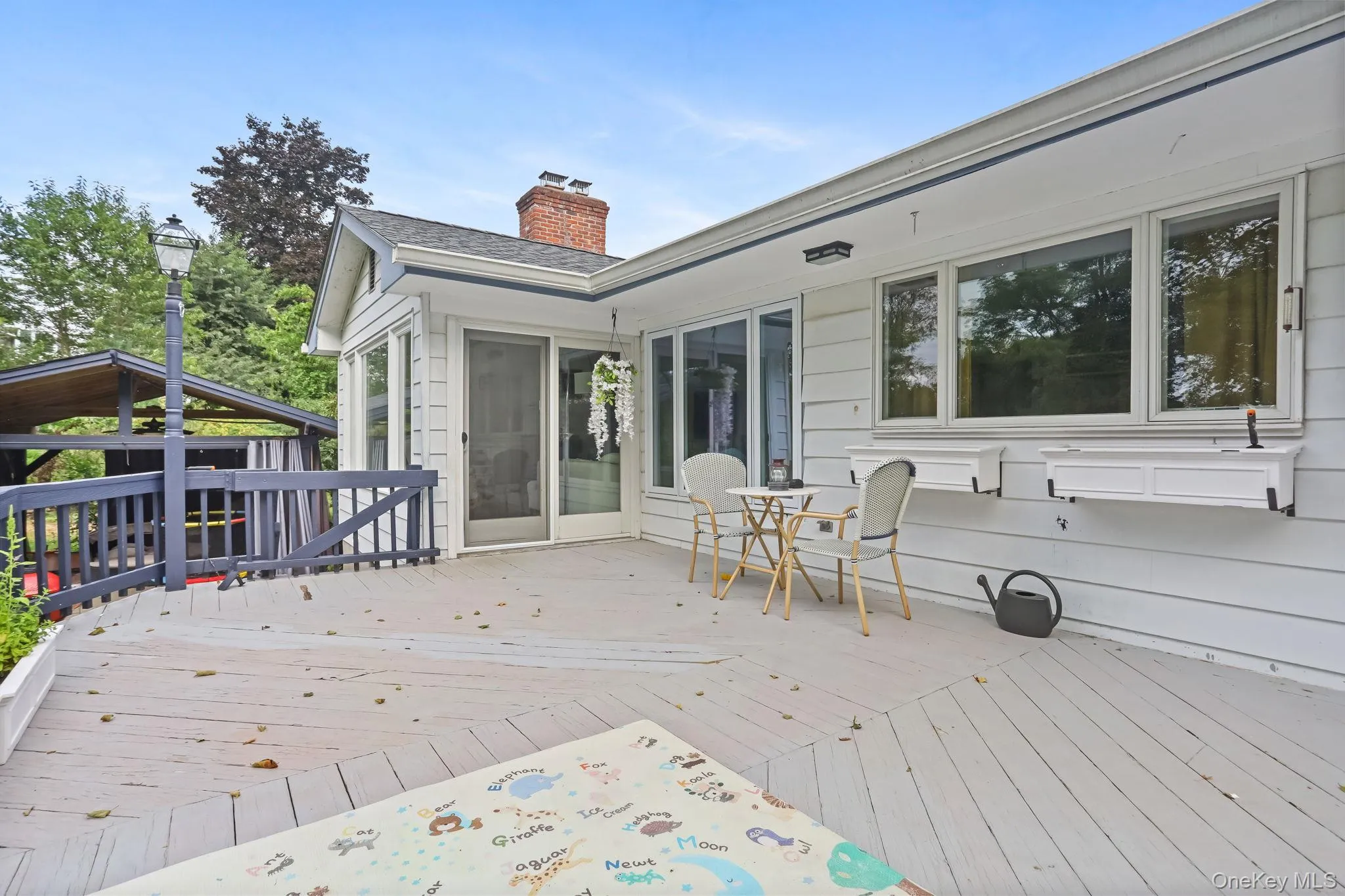 Deck off of kitchen and family room makes for easy living and entertaining Deck off of kitchen and family room makes for easy living and entertaining