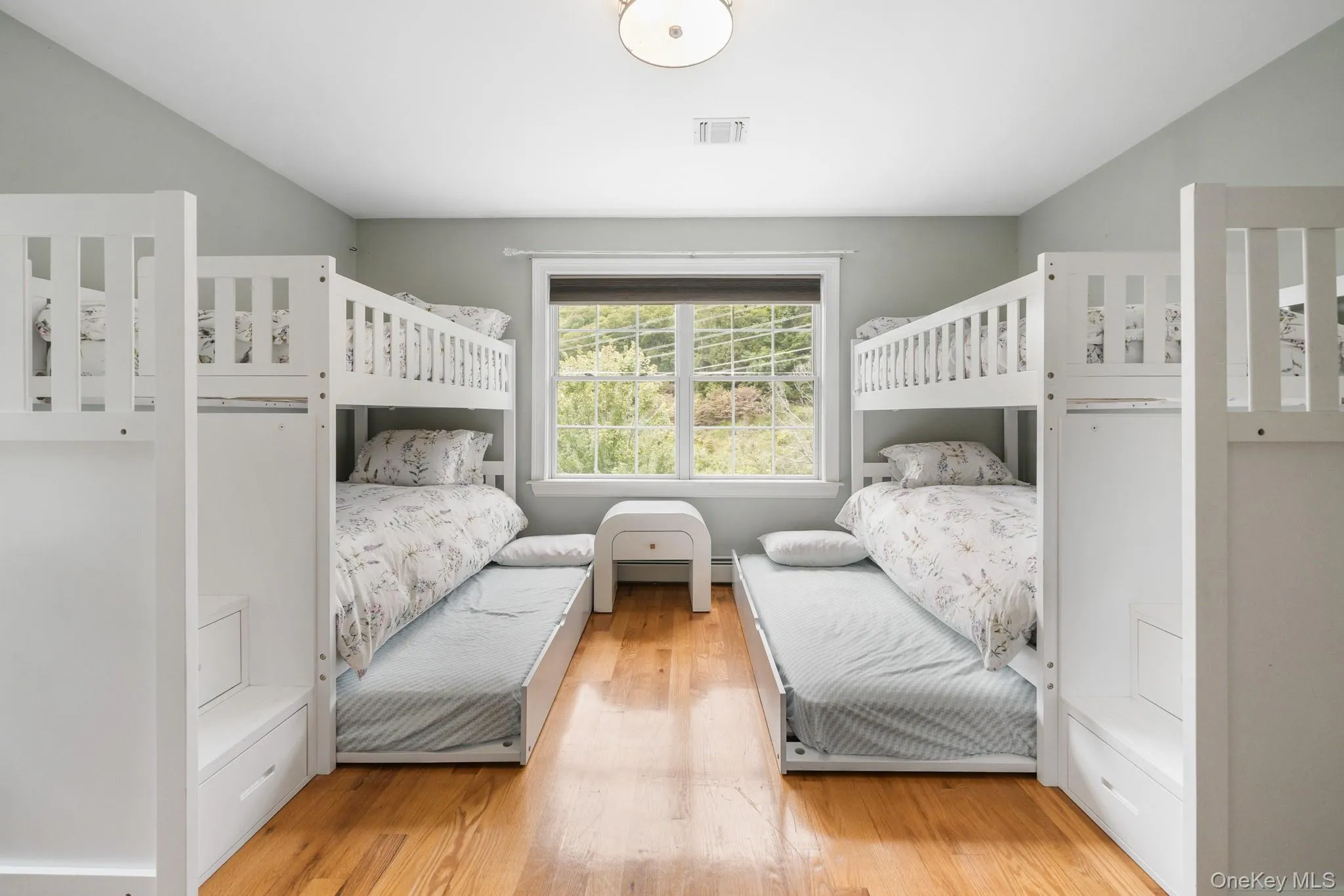 Bedroom featuring light wood-style floors Bedroom featuring light wood-style floors