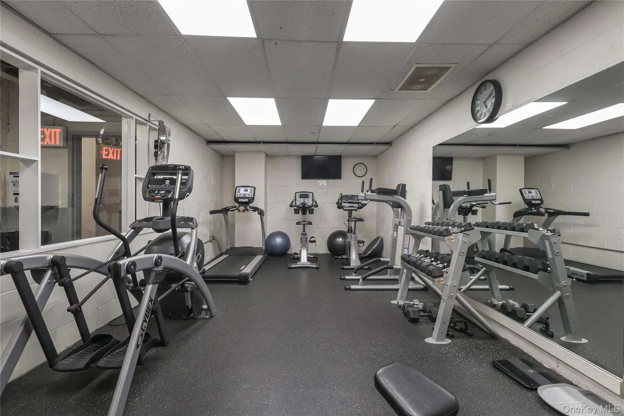 Gym with a paneled ceiling Gym with a paneled ceiling