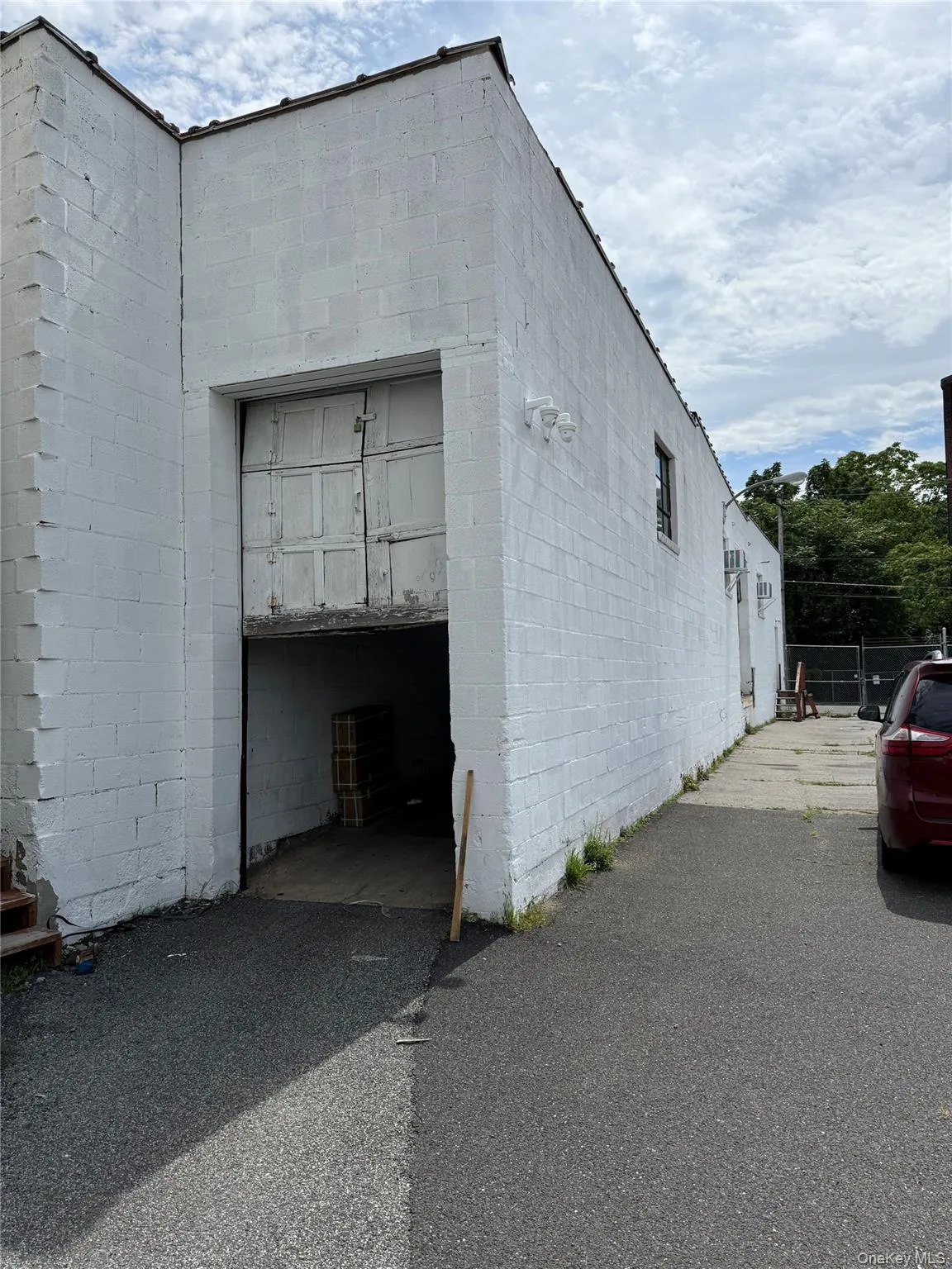 concrete block siding and a garage concrete block siding and a garage