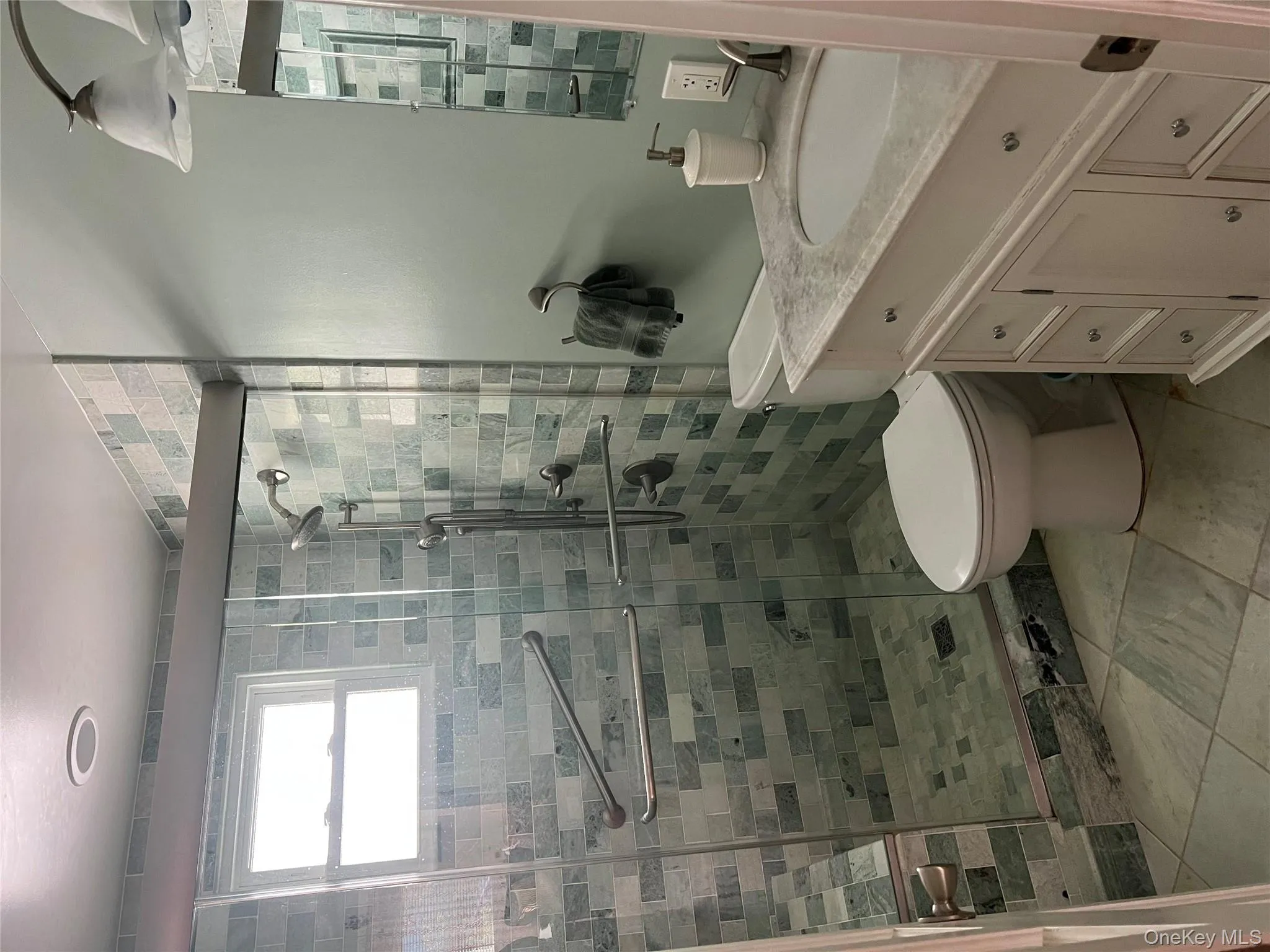 Full bathroom with vanity and a stall shower Full bathroom with vanity and a stall shower