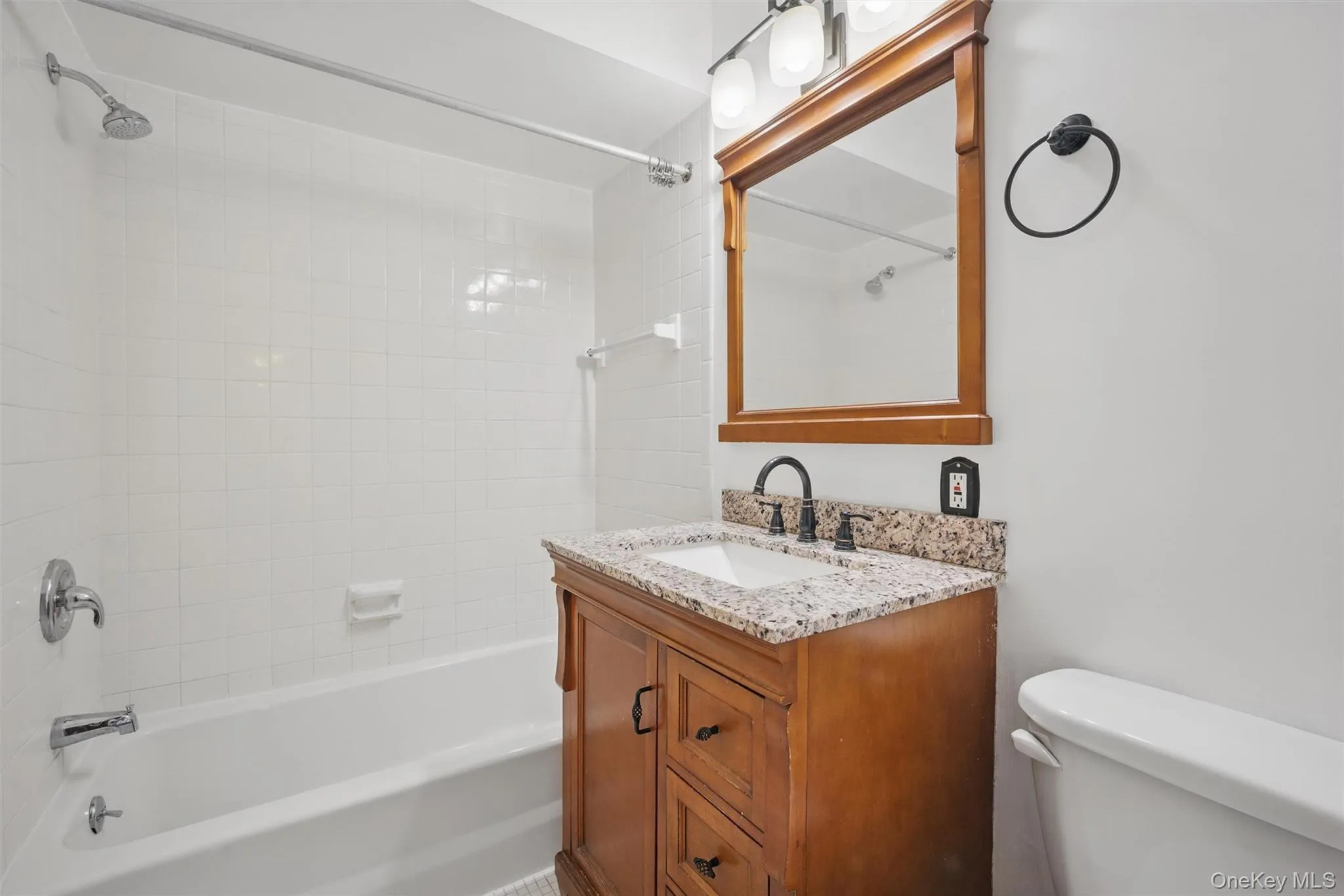 Full bath with bathtub / shower combination and vanity Full bath with bathtub / shower combination and vanity
