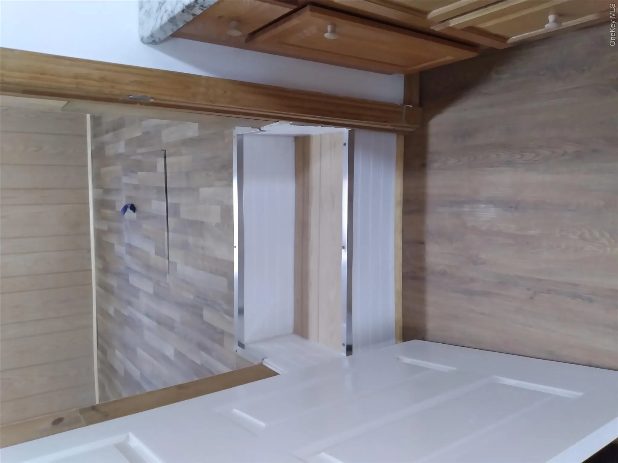 Bathroom featuring dark wood-type flooring and vanity Bathroom featuring dark wood-type flooring and vanity