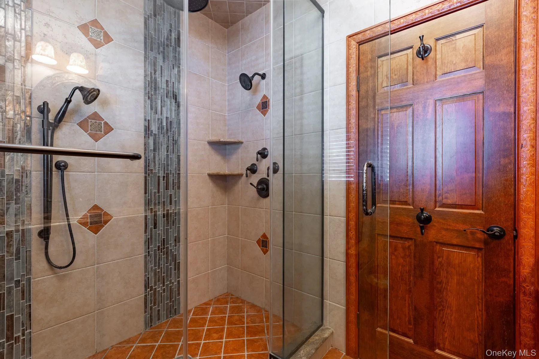Full bathroom featuring a stall shower Full bathroom featuring a stall shower