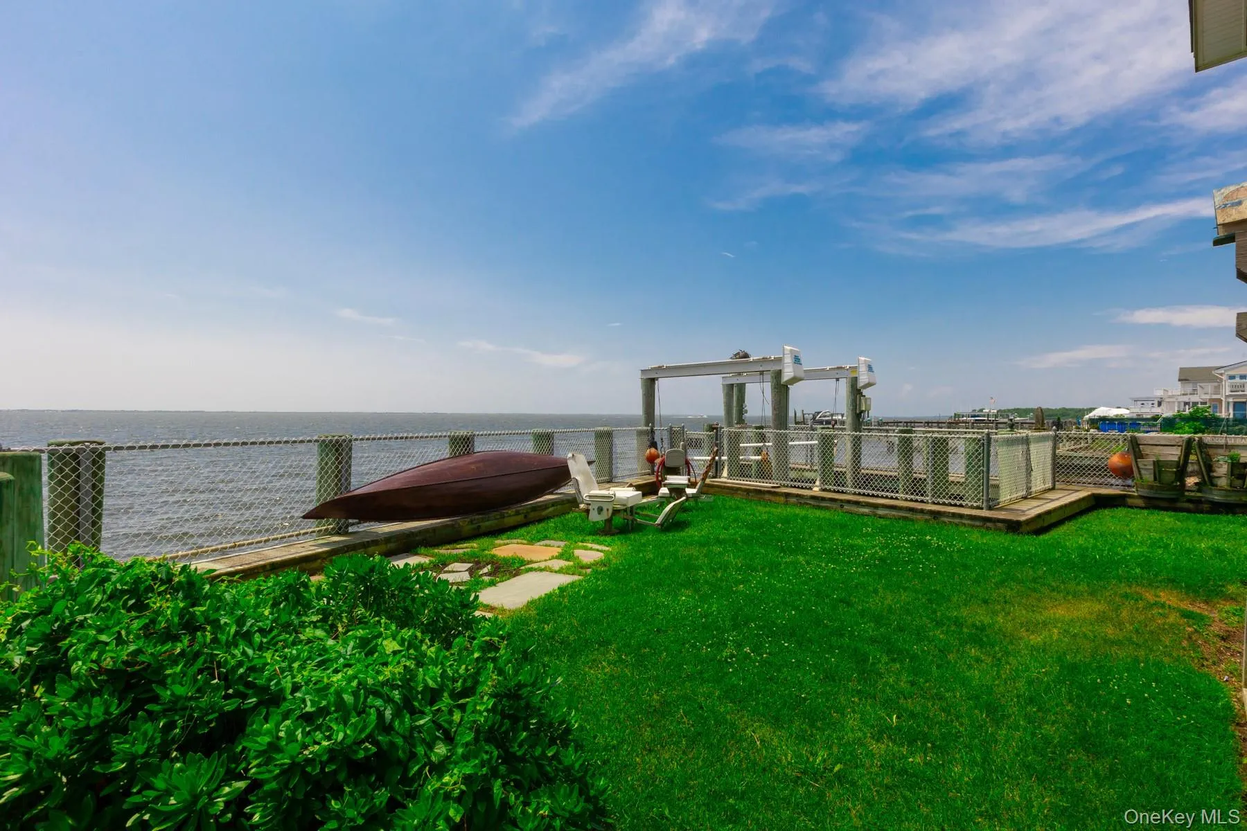 View of yard with a deck with water view View of yard with a deck with water view