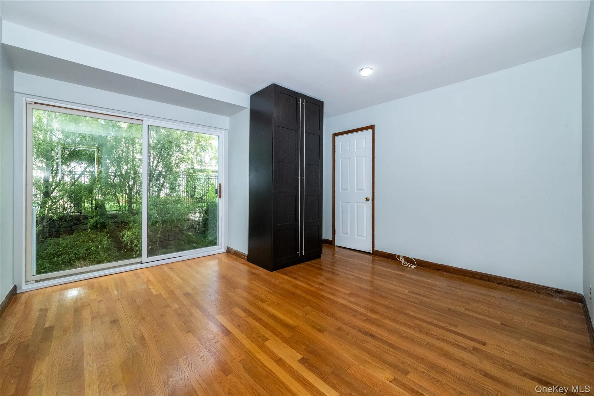 bedroom with light wood finished floors bedroom with light wood finished floors