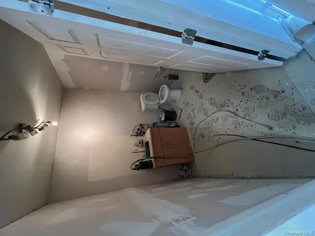 Bathroom with toilet and a sink Bathroom with toilet and a sink