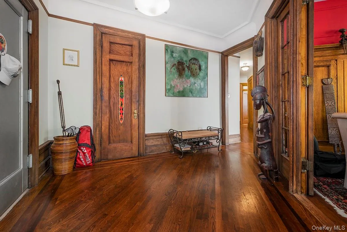 Entrance foyer featuring wood finished floors Entrance foyer featuring wood finished floors