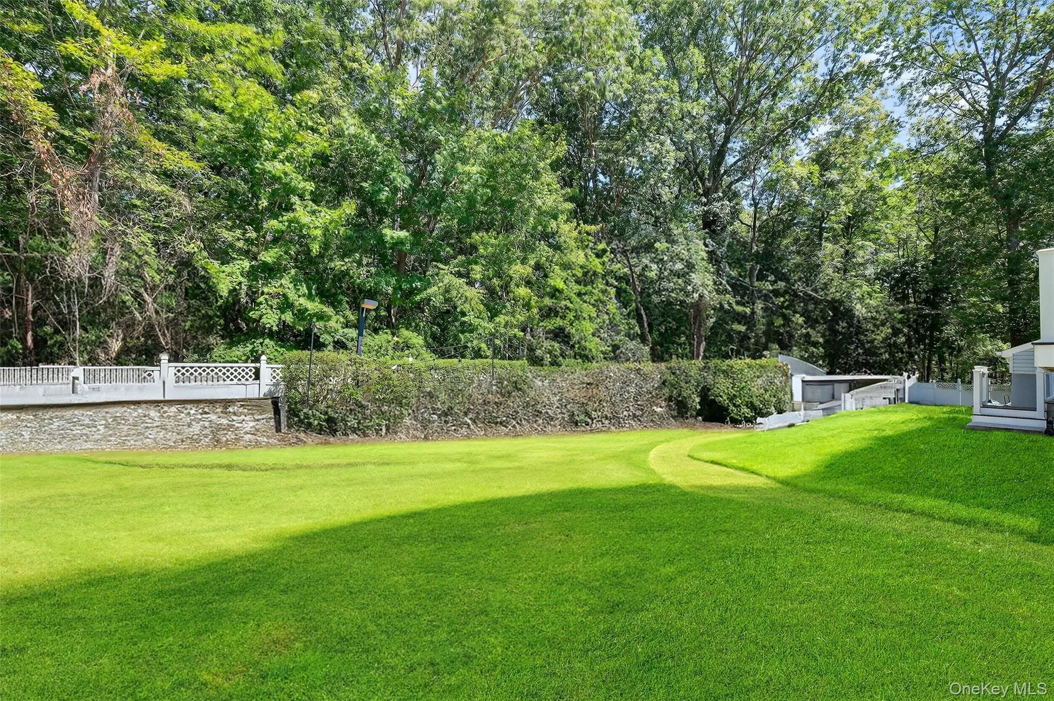 View of yard featuring a wooden deck View of yard featuring a wooden deck