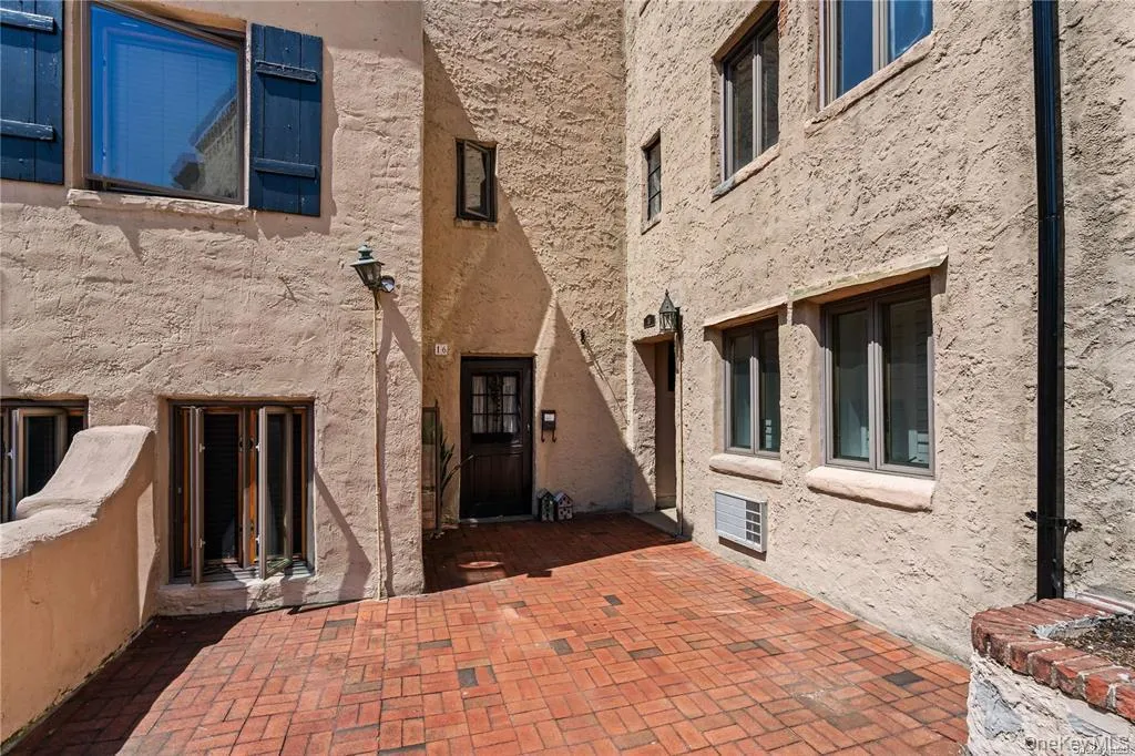 Entrance to property featuring a patio Entrance to property featuring a patio