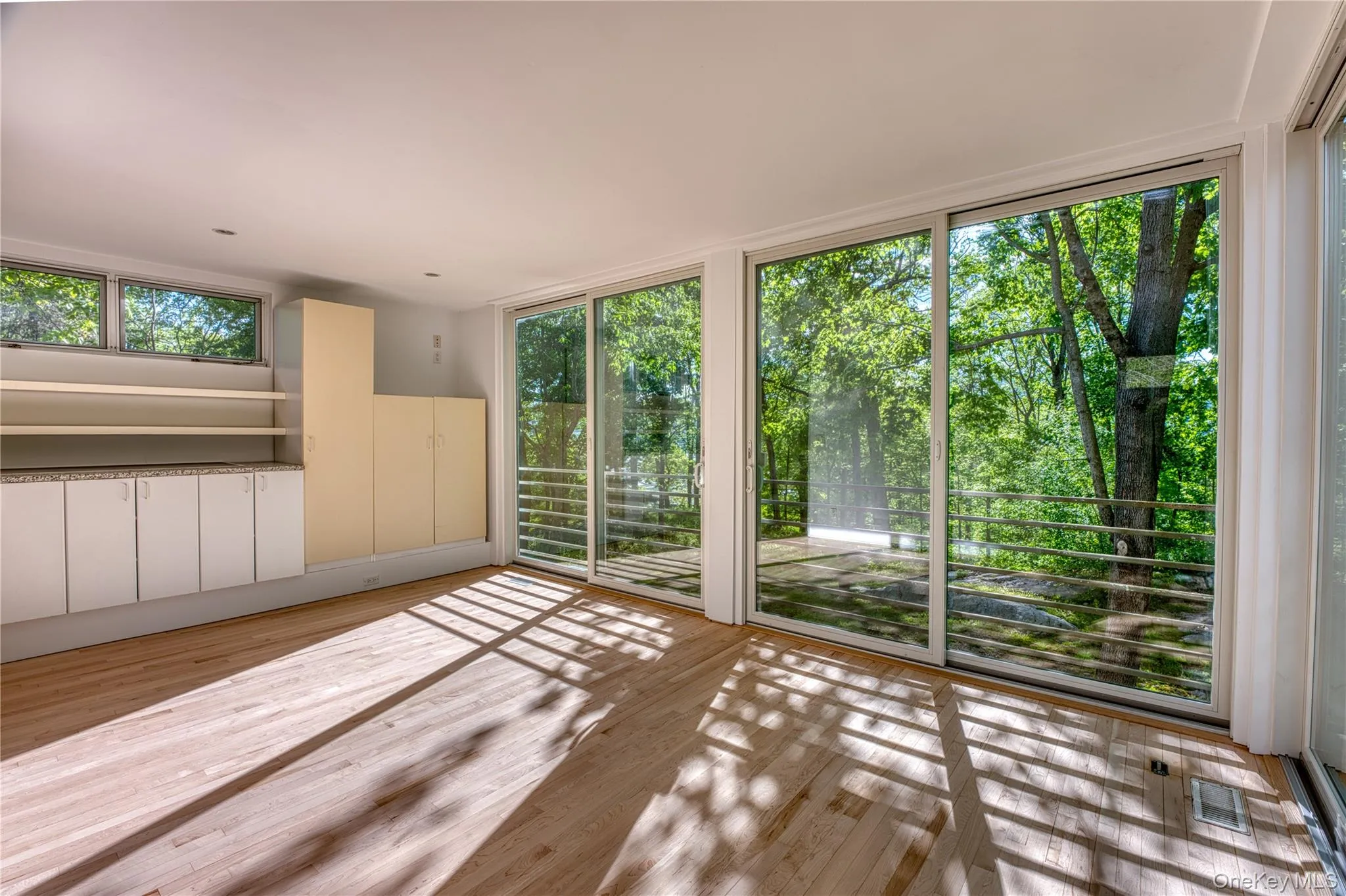 Primary BR with New Anderson Windows, Refinished Hardwood Floors Primary BR with New Anderson Windows, Refinished Hardwood Floors