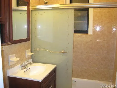 Full bath with vanity Full bath with vanity