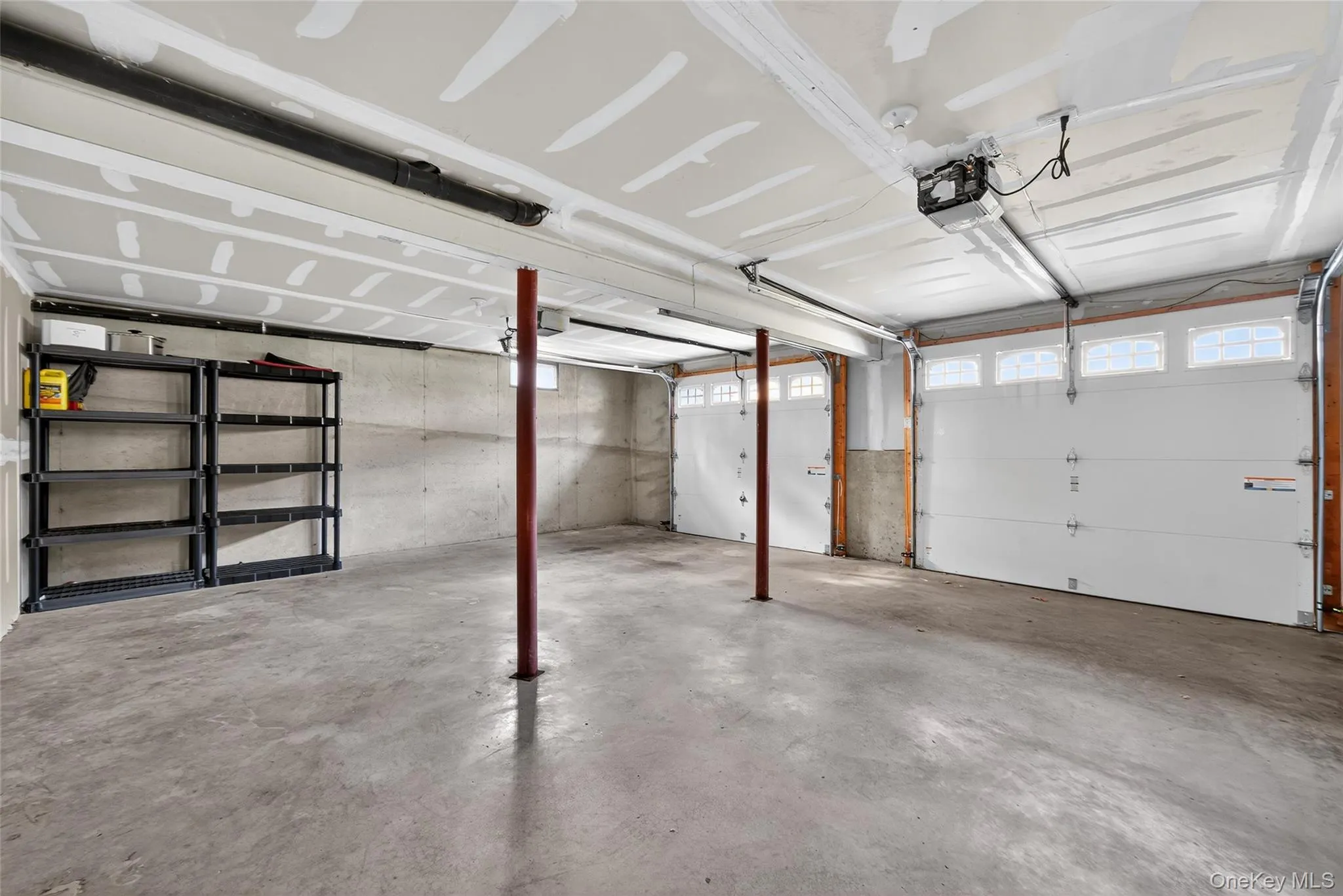 Garage with a garage door opener Garage with a garage door opener