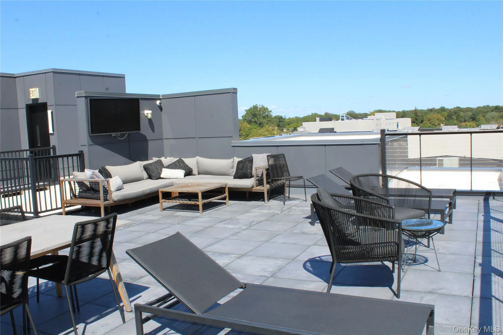 View of patio / terrace featuring outdoor dining area and an outdoor hangout area View of patio / terrace featuring outdoor dining area and an outdoor hangout area