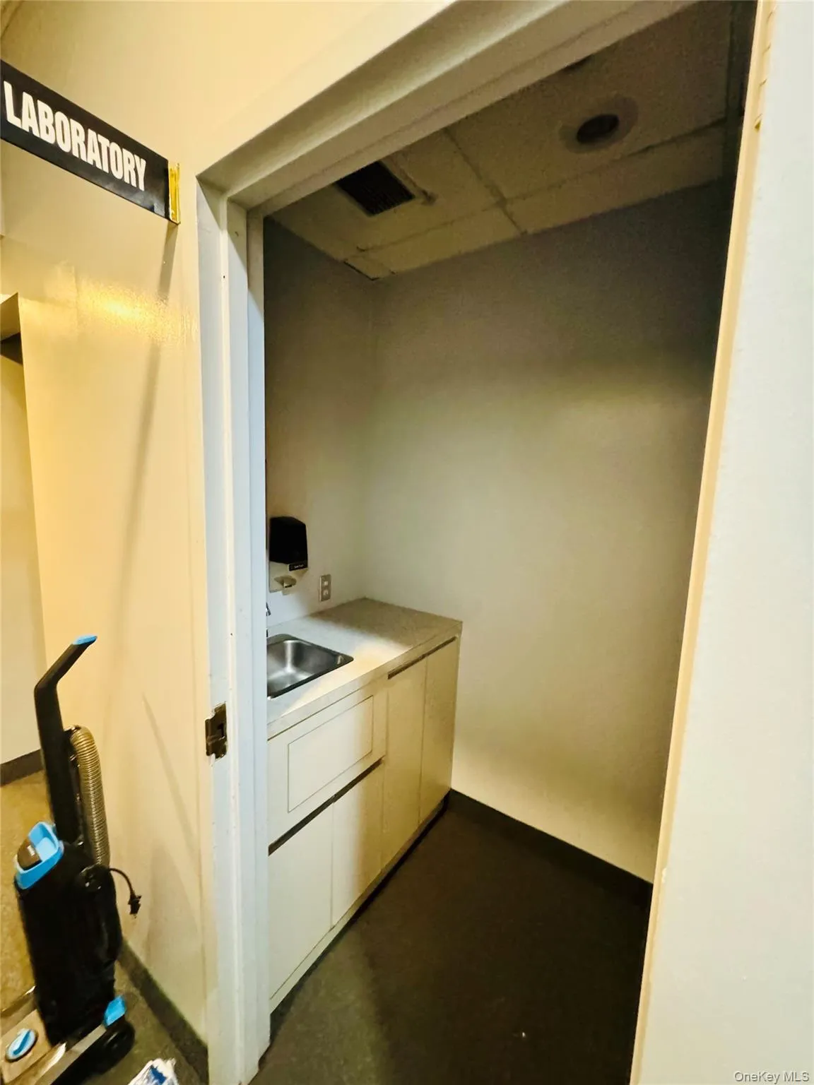 Kitchen with white cabinets and light countertops Kitchen with white cabinets and light countertops