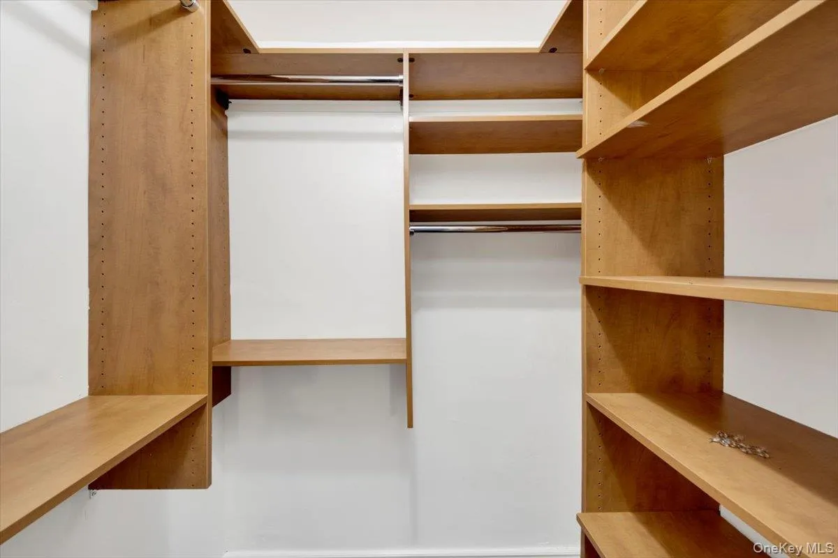 Primary walk-in closet Primary walk-in closet
