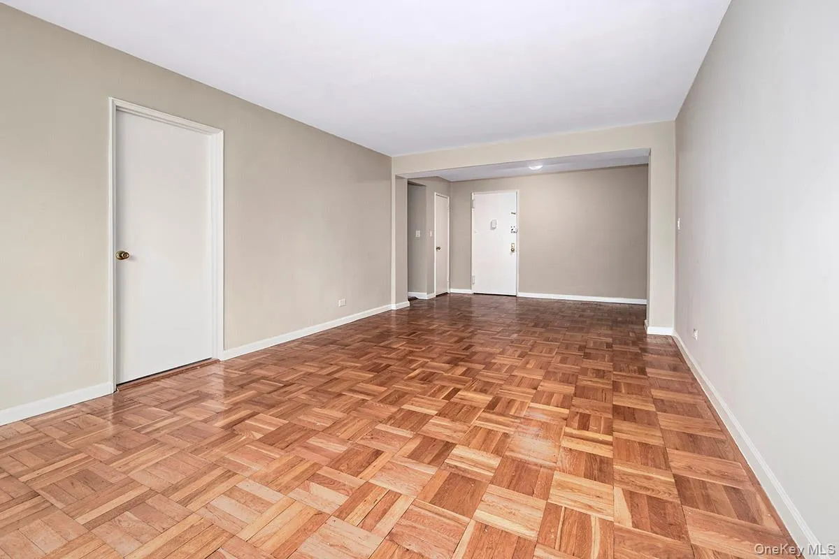 Empty room featuring baseboards Empty room featuring baseboards