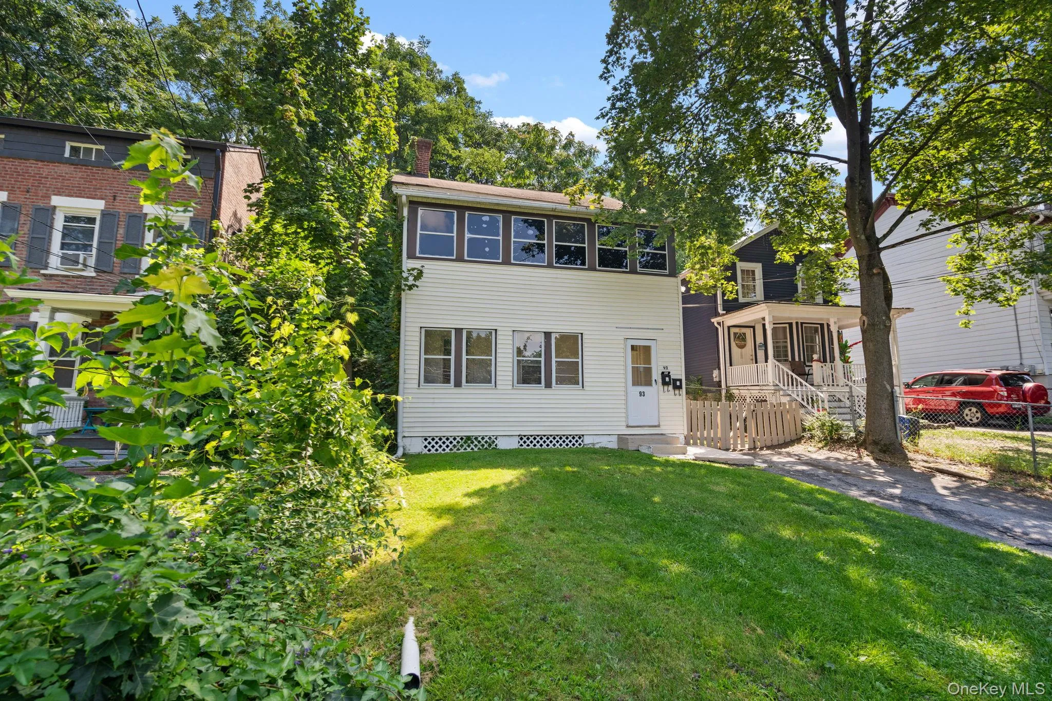 View of front facade featuring a chimney View of front facade featuring a chimney