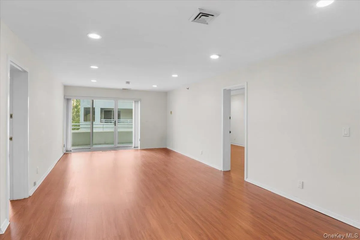 Spare room with recessed lighting and light wood-style flooring Spare room with recessed lighting and light wood-style flooring