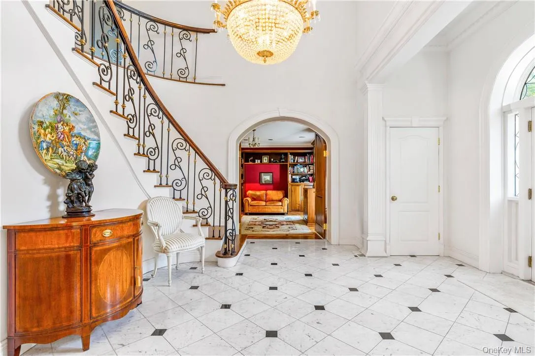 Two story foyer with beautiful details Two story foyer with beautiful details