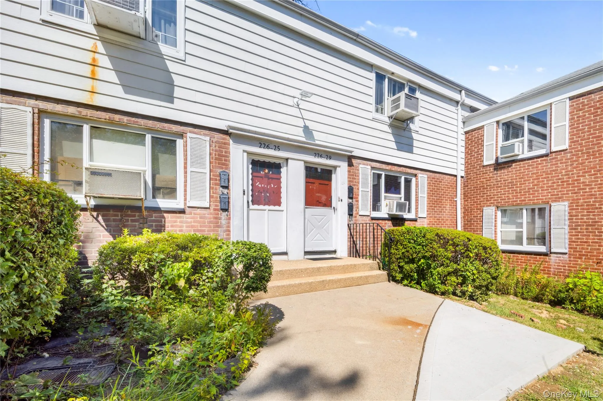 Entrance to property featuring brick siding Entrance to property featuring brick siding