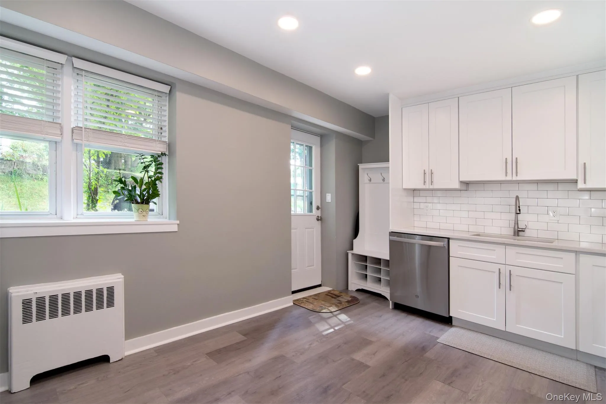 New kitchen with subway tile backsplash, dishwasher, microwave, granite tops New kitchen with subway tile backsplash, dishwasher, microwave, granite tops