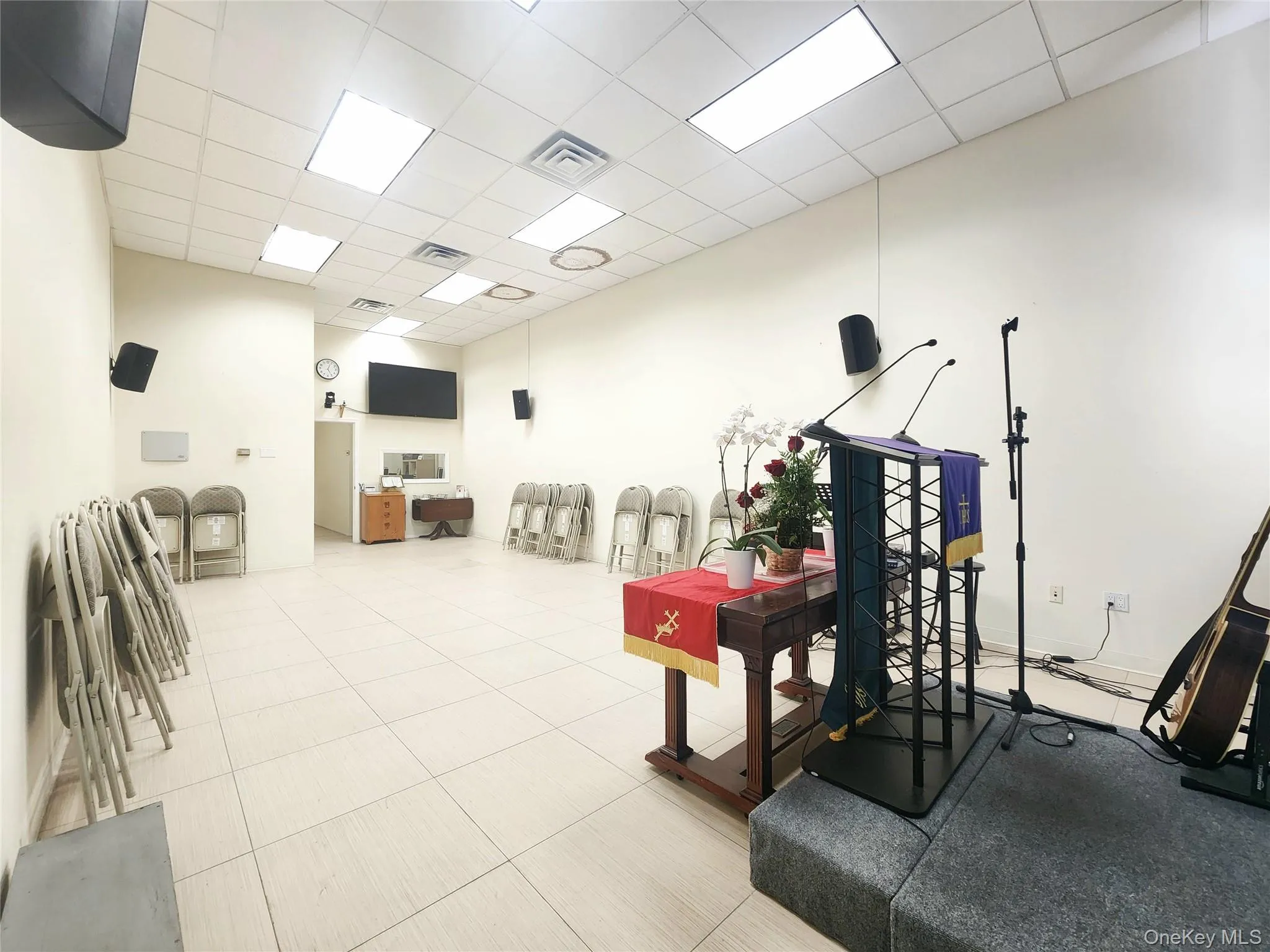 Exercise room featuring a drop ceiling Exercise room featuring a drop ceiling