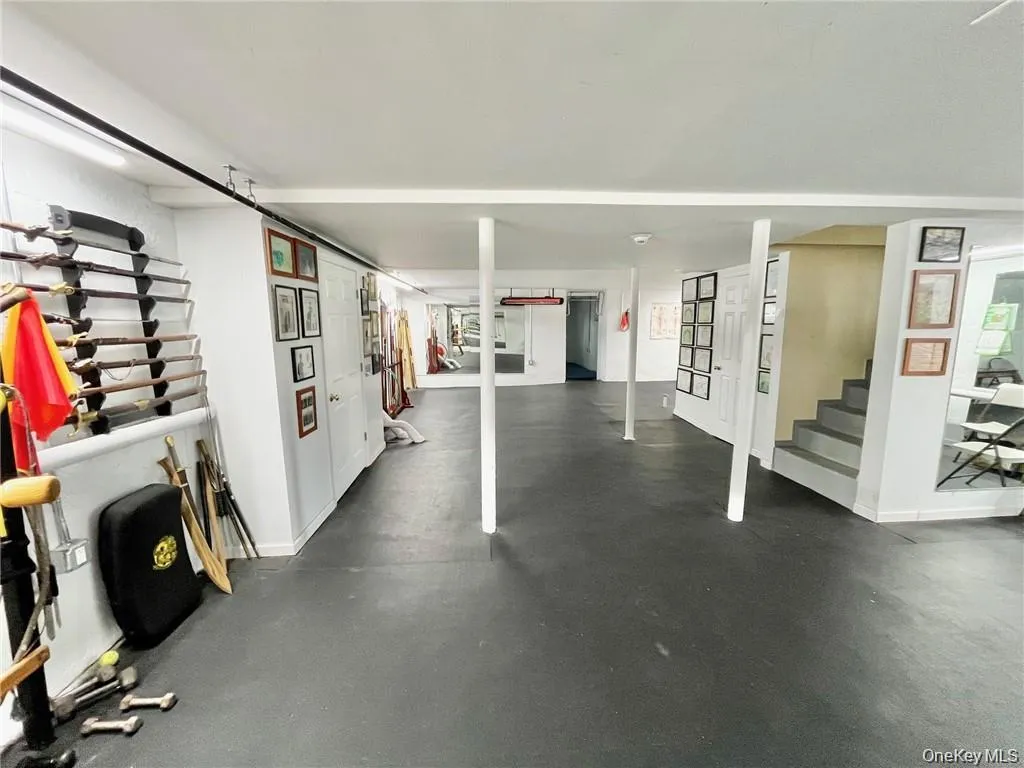 Garage featuring baseboards Garage featuring baseboards