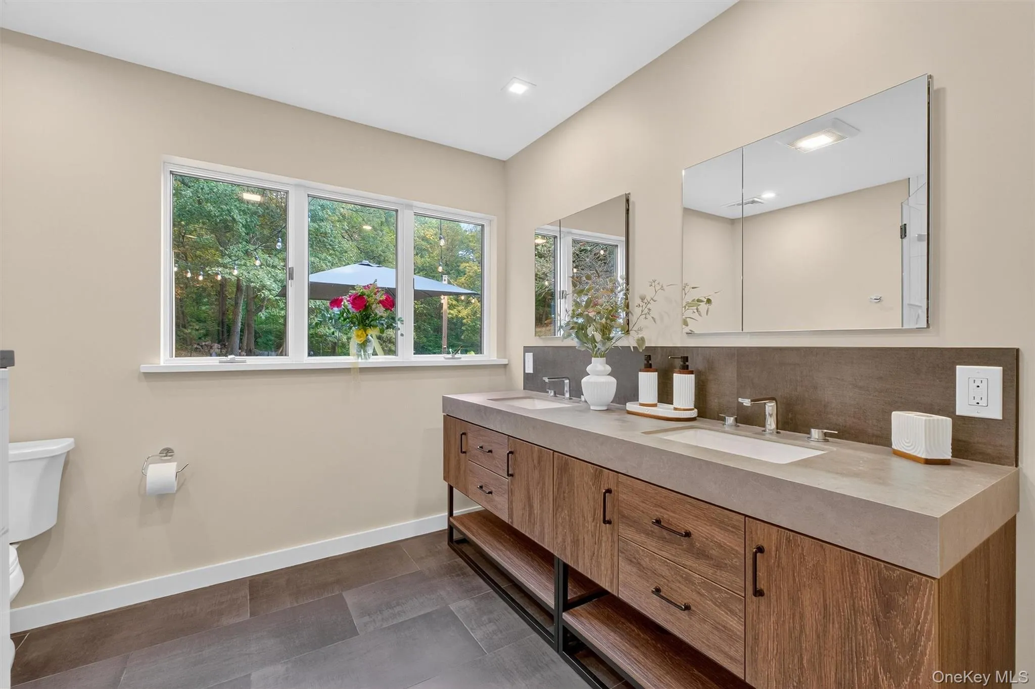 Attached primary full bath  with double vanity and backsplash Attached primary full bath  with double vanity and backsplash