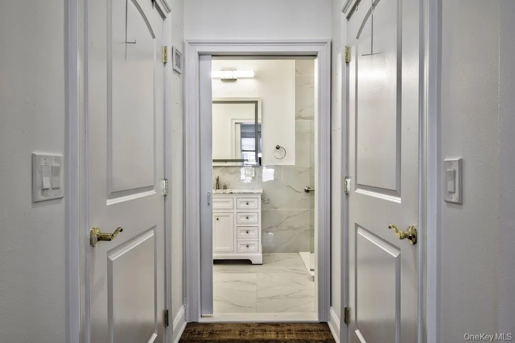 Hall with dark marble finish floors Hall with dark marble finish floors