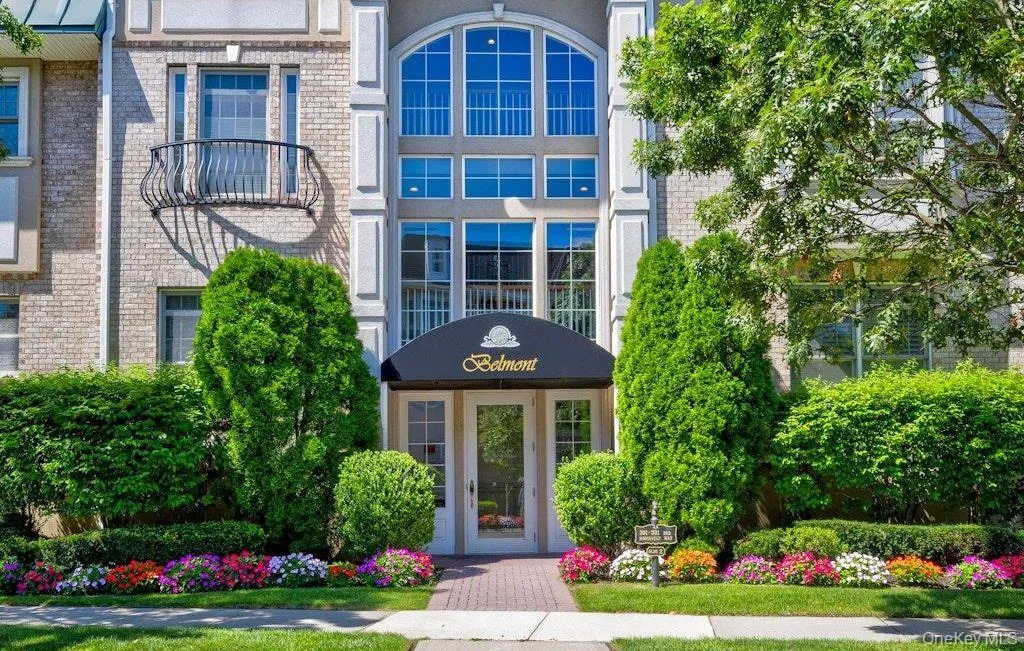 Property entrance featuring brick siding Property entrance featuring brick siding