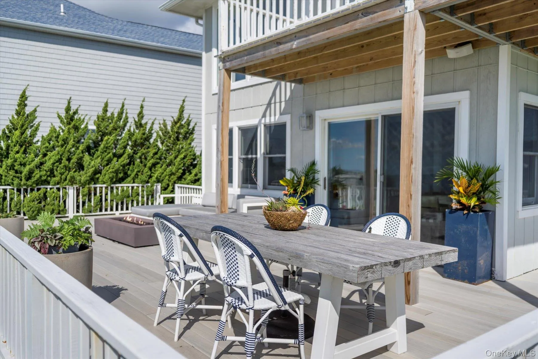 Relax by the fire pit or outdoor dining while enjoying bay views. Relax by the fire pit or outdoor dining while enjoying bay views.