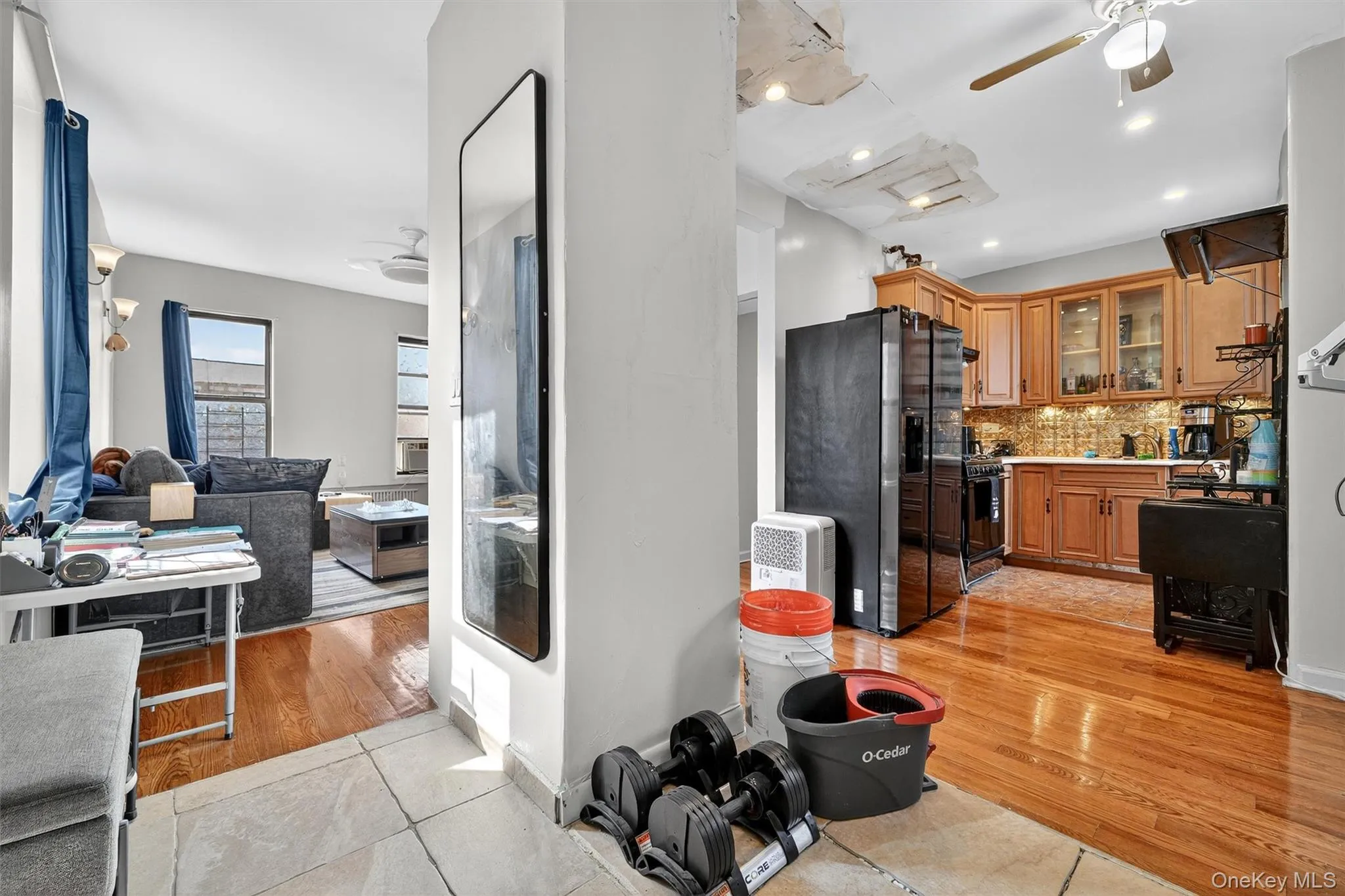 Kitchen with a ceiling fan and hardwood floors Kitchen with a ceiling fan and hardwood floors