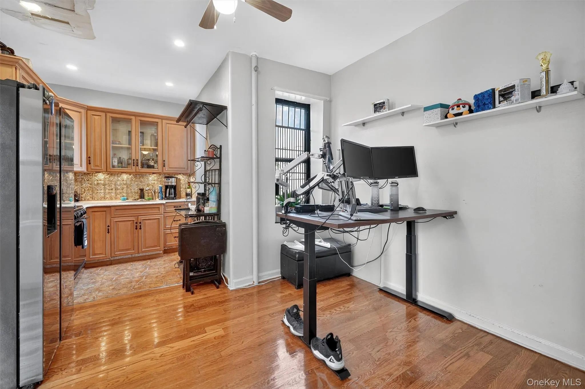 Dining area utilized as an office. Dining area utilized as an office.