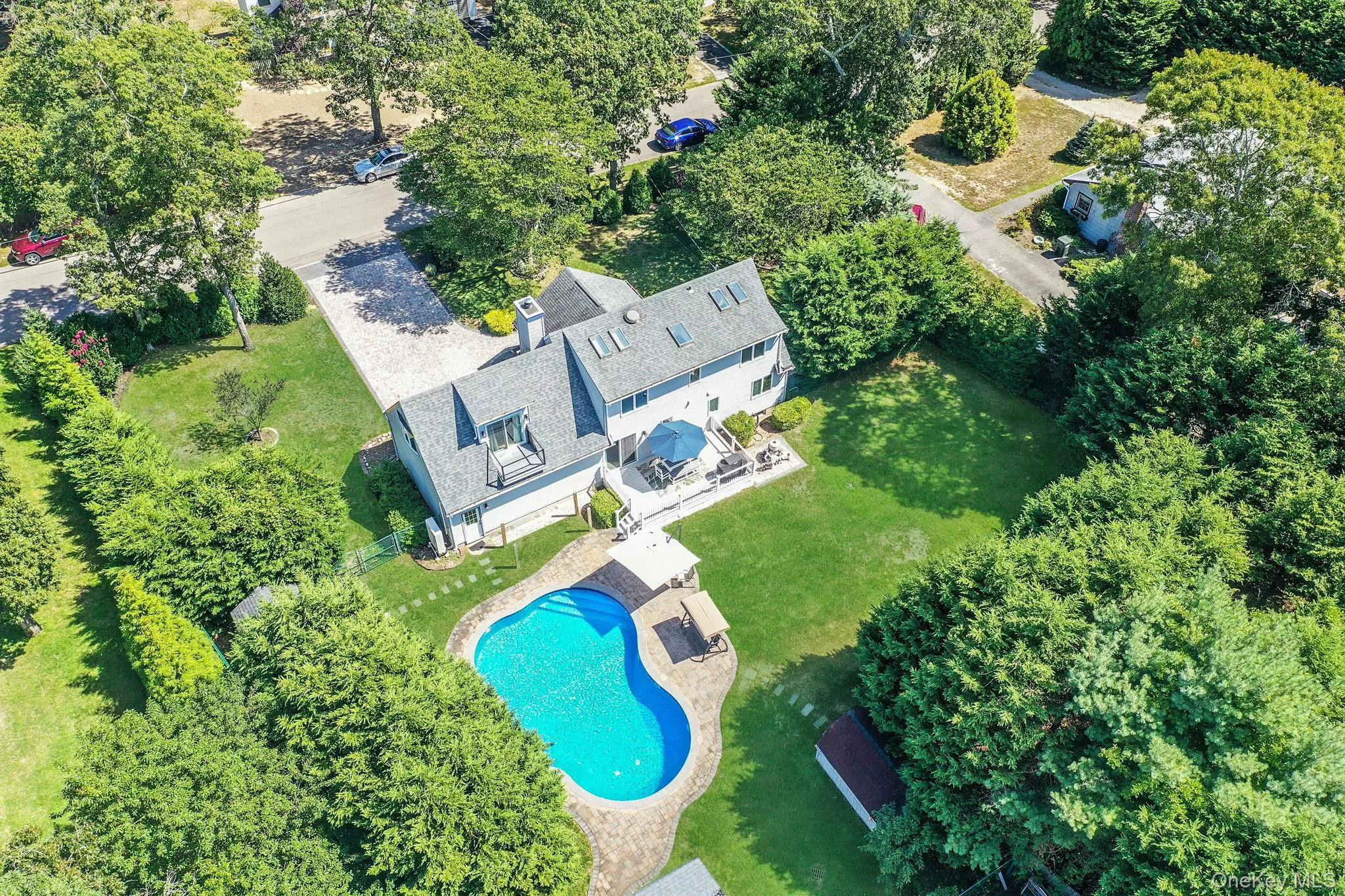 View of subject property with a pool View of subject property with a pool