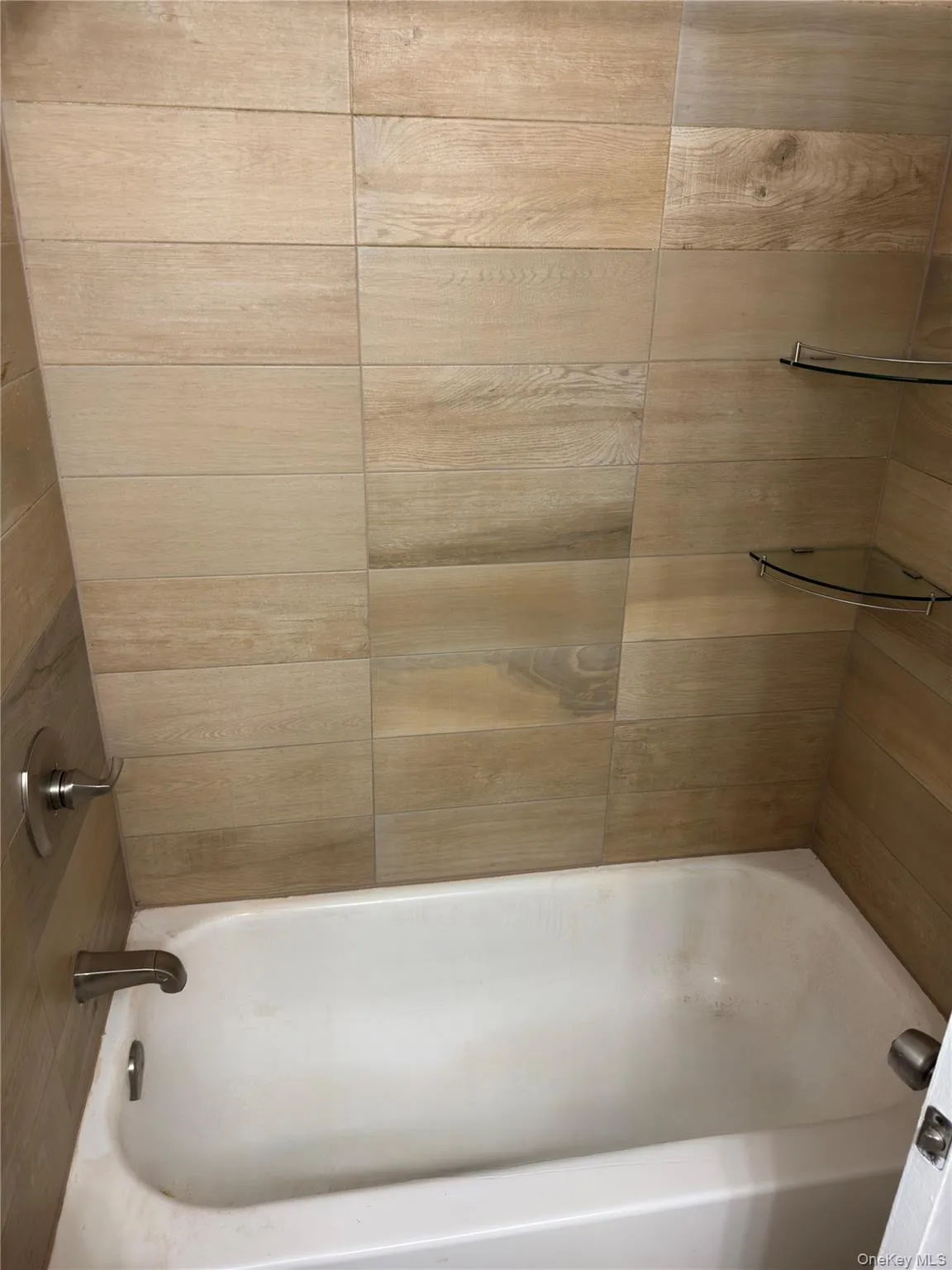 Full bath with shower / bath combination Full bath with shower / bath combination
