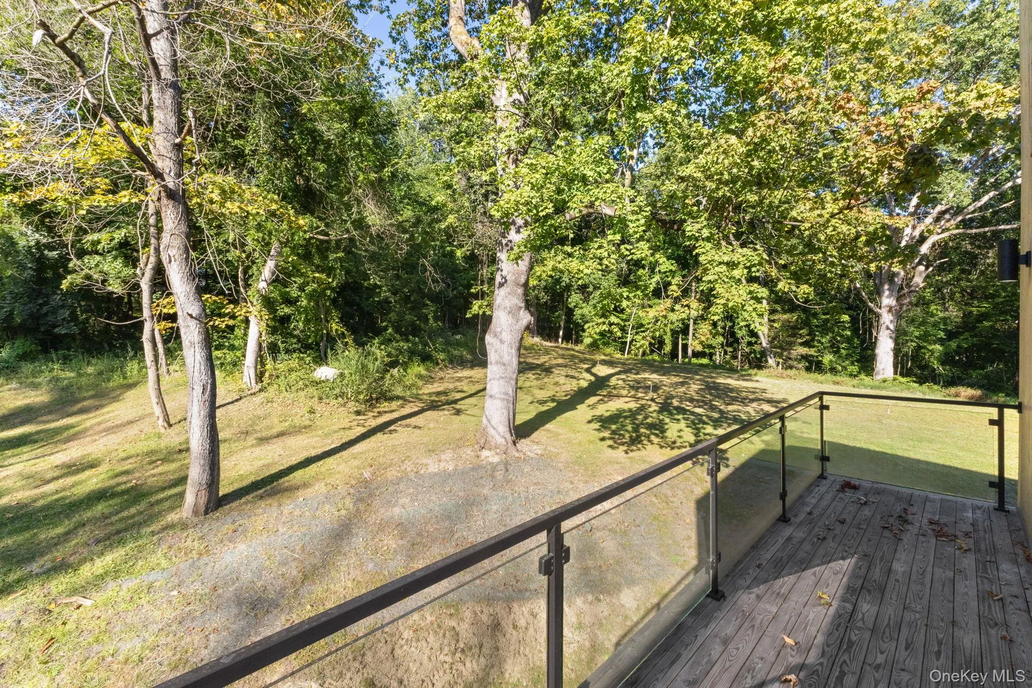 Deck with a yard Deck with a yard