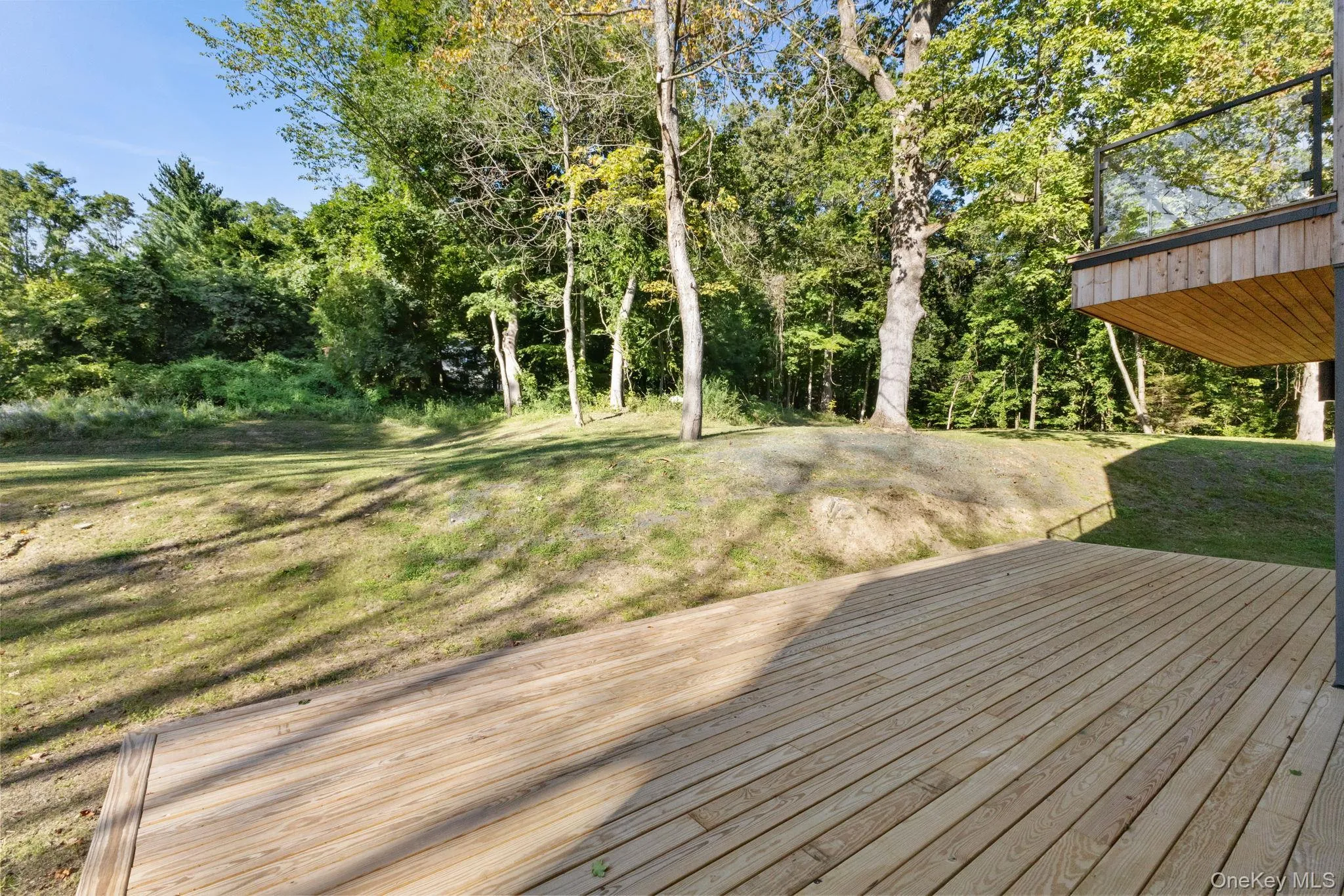 Wooden terrace with a yard Wooden terrace with a yard