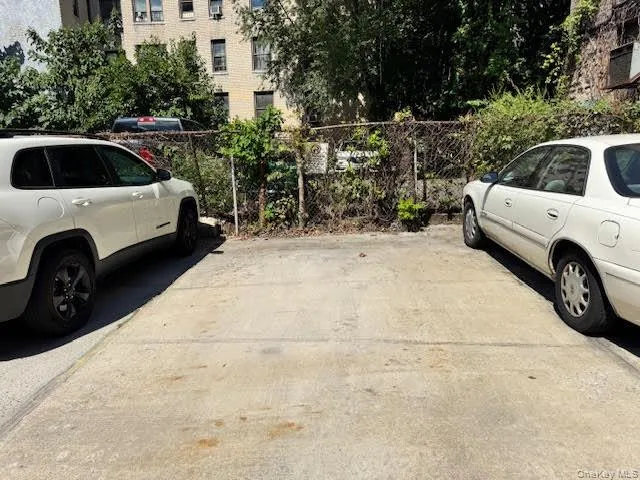View of uncovered parking lot View of uncovered parking lot