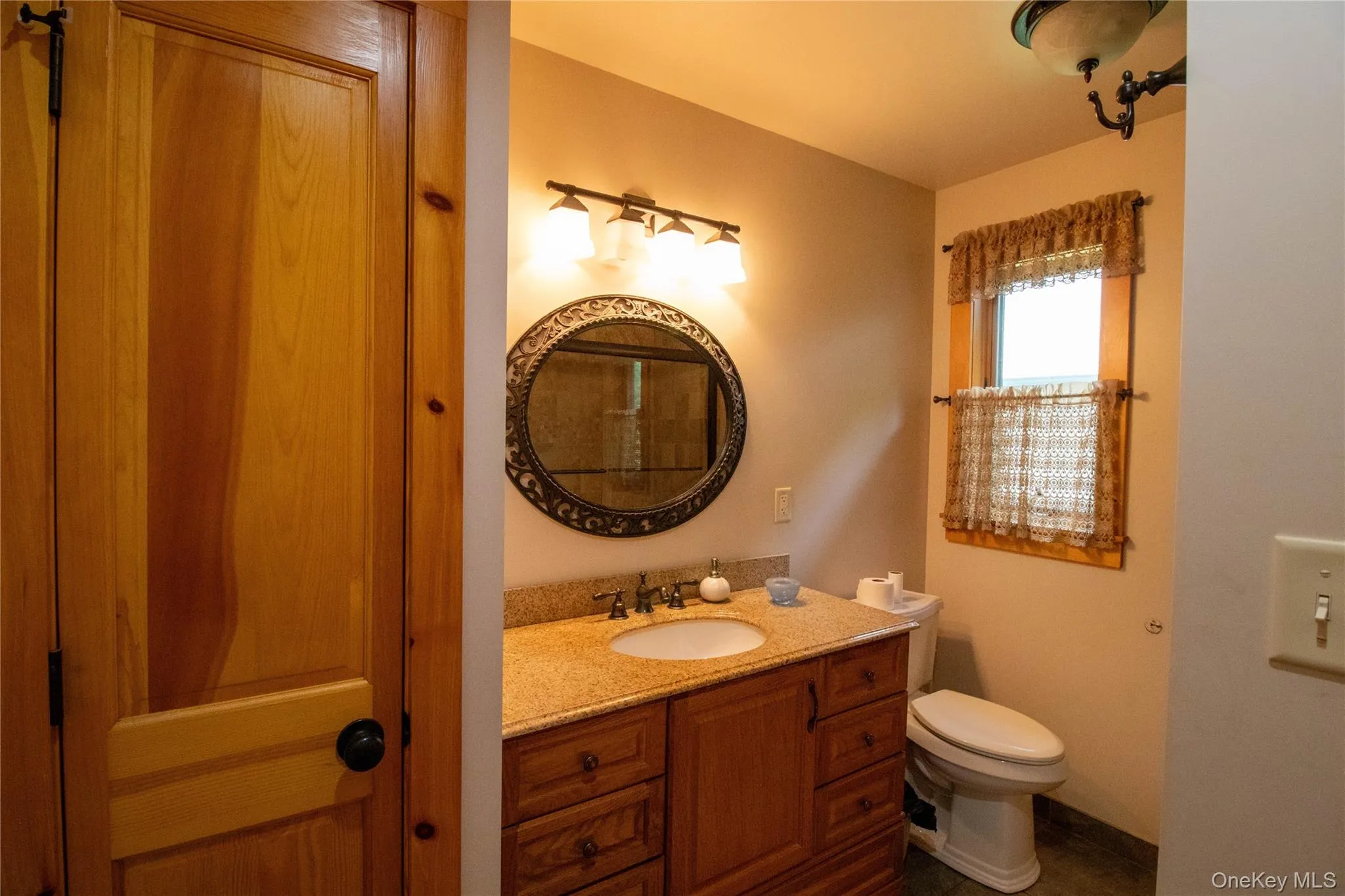 Bathroom with vanity and toilet Bathroom with vanity and toilet