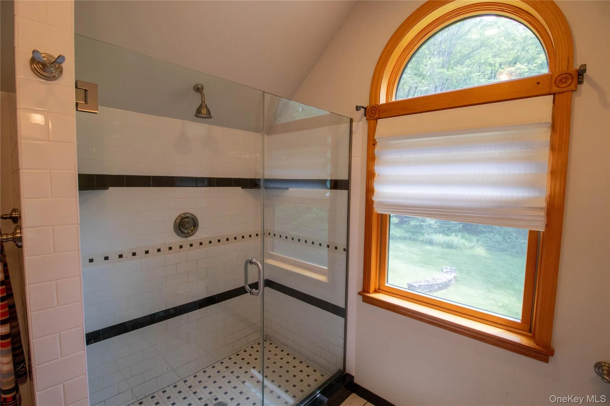 Full bathroom with a stall shower Full bathroom with a stall shower