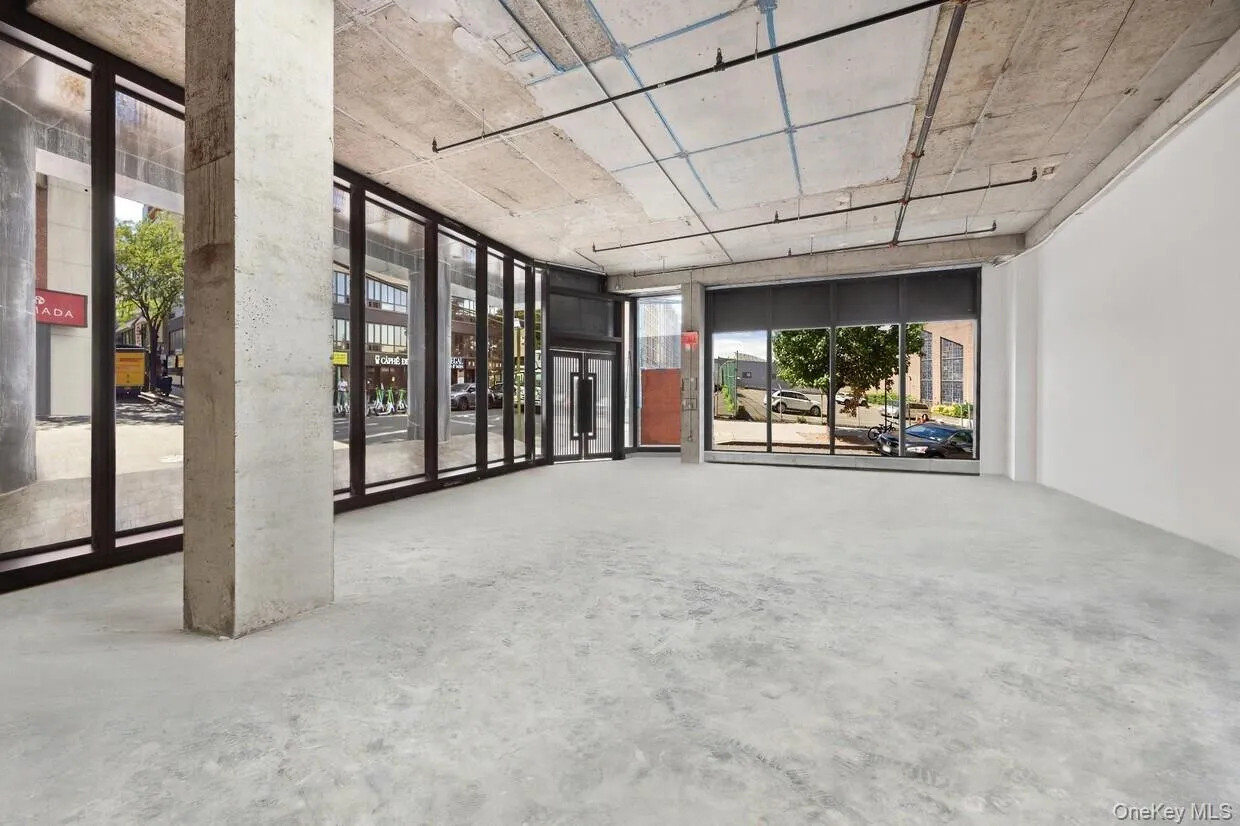 Common area featuring floor to ceiling windows Common area featuring floor to ceiling windows
