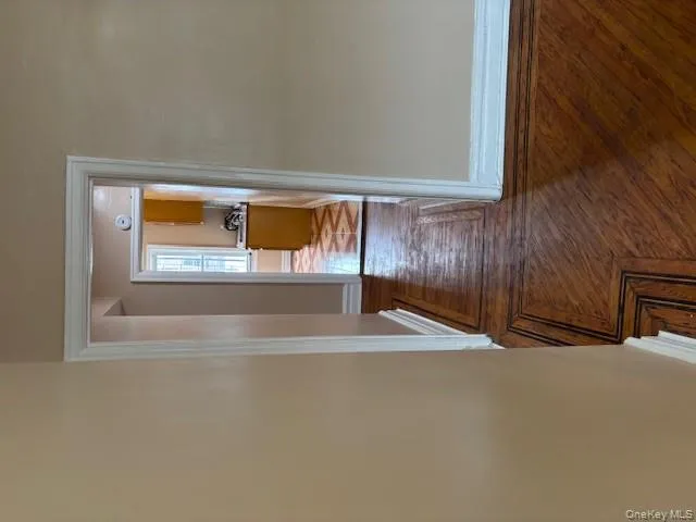 Corridor featuring baseboards Corridor featuring baseboards