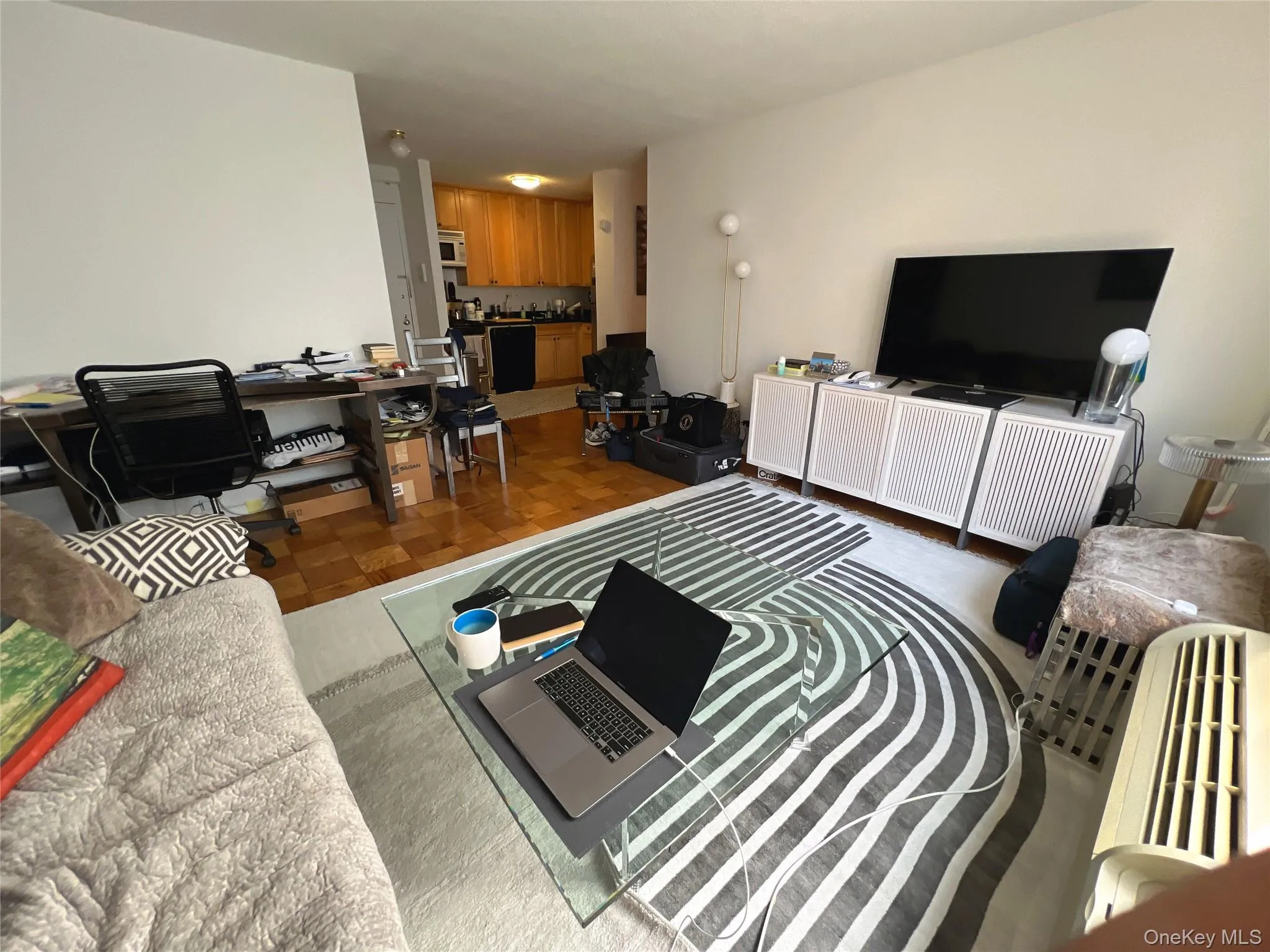 Living room featuring a desk Living room featuring a desk