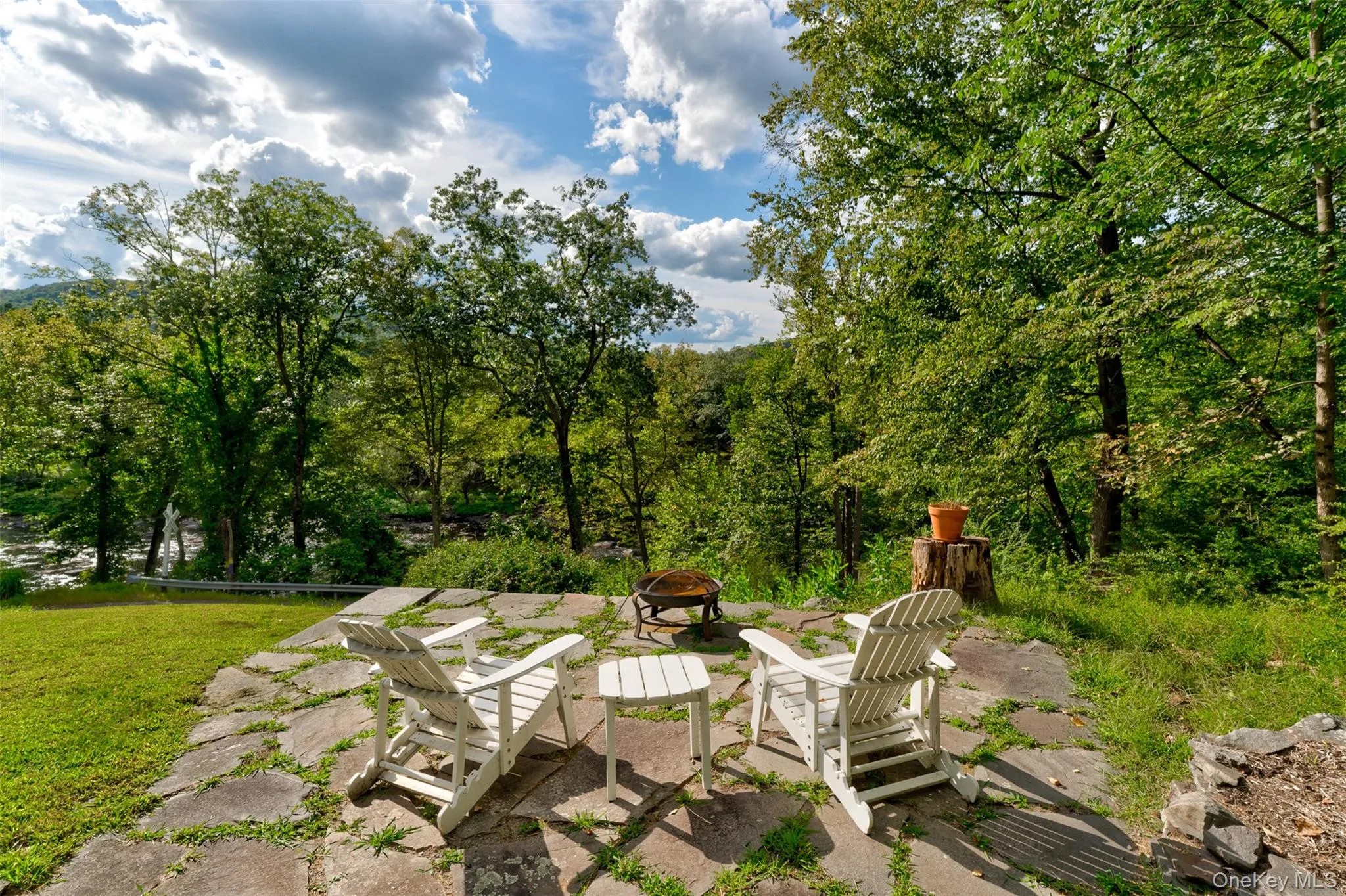 View of patio featuring an outdoor fire pit View of patio featuring an outdoor fire pit