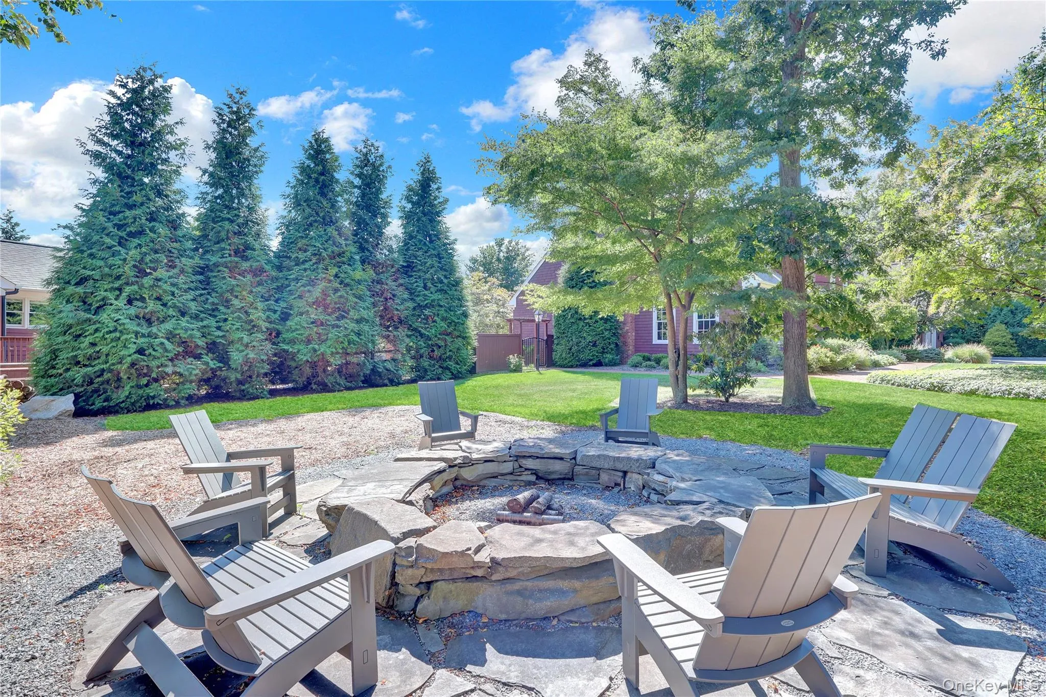 View of patio with an outdoor fire pit View of patio with an outdoor fire pit