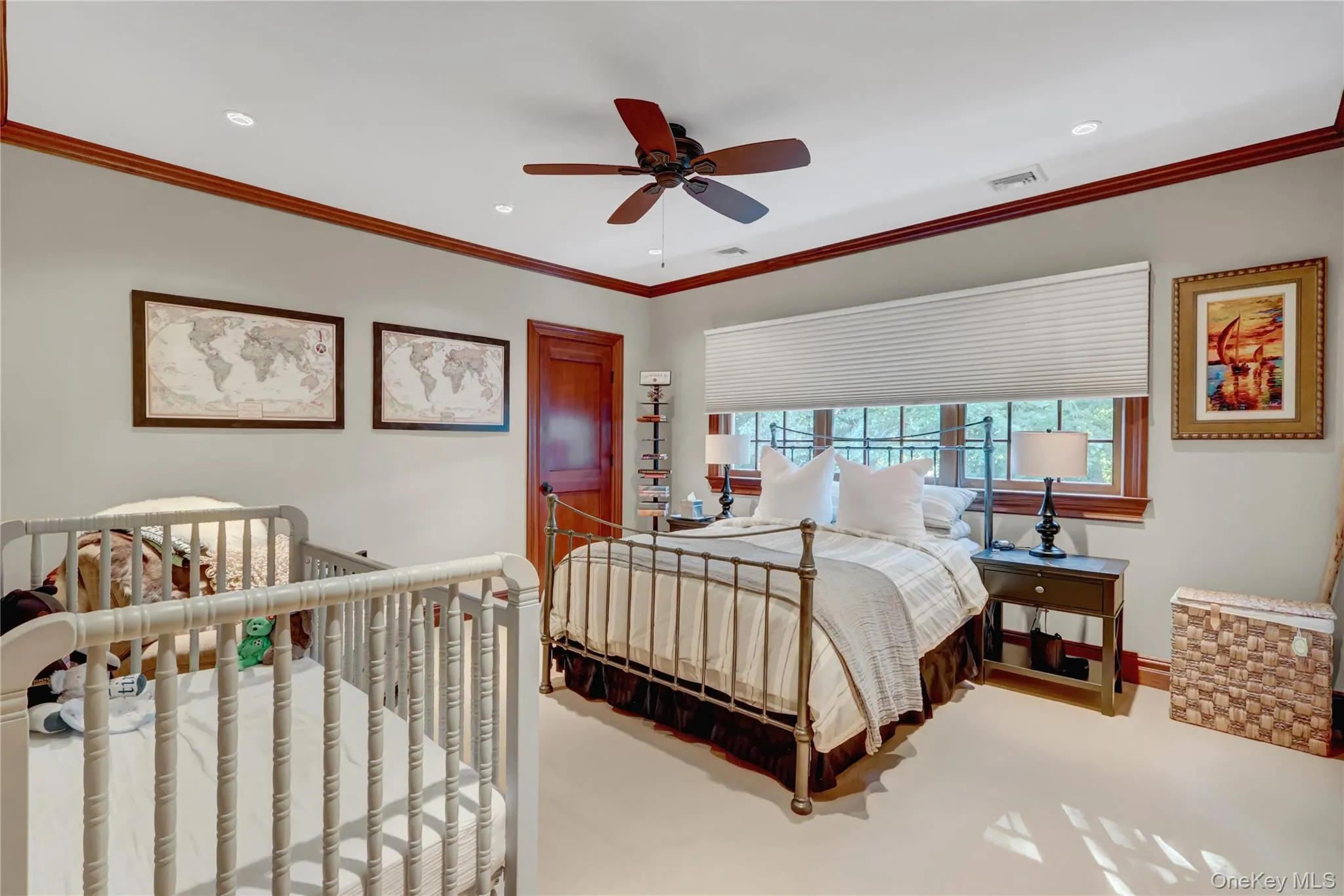 Bedroom with crown molding, ceiling fan, recessed lighting, and carpet flooring Bedroom with crown molding, ceiling fan, recessed lighting, and carpet flooring