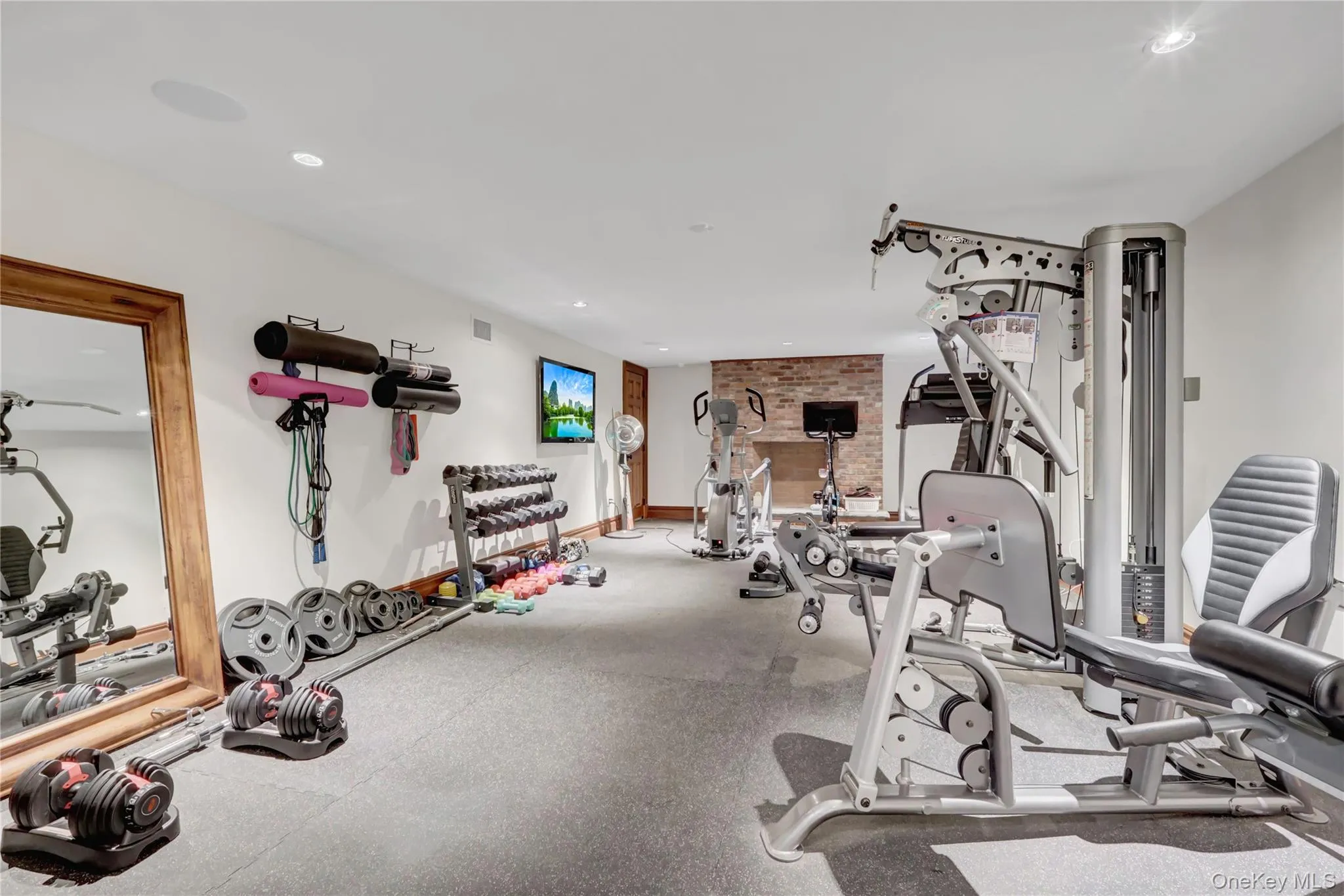 Exercise room featuring recessed lighting Exercise room featuring recessed lighting